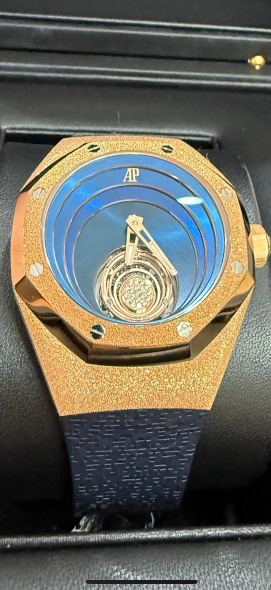 May be an image of wrist watch and text that says 'AP'