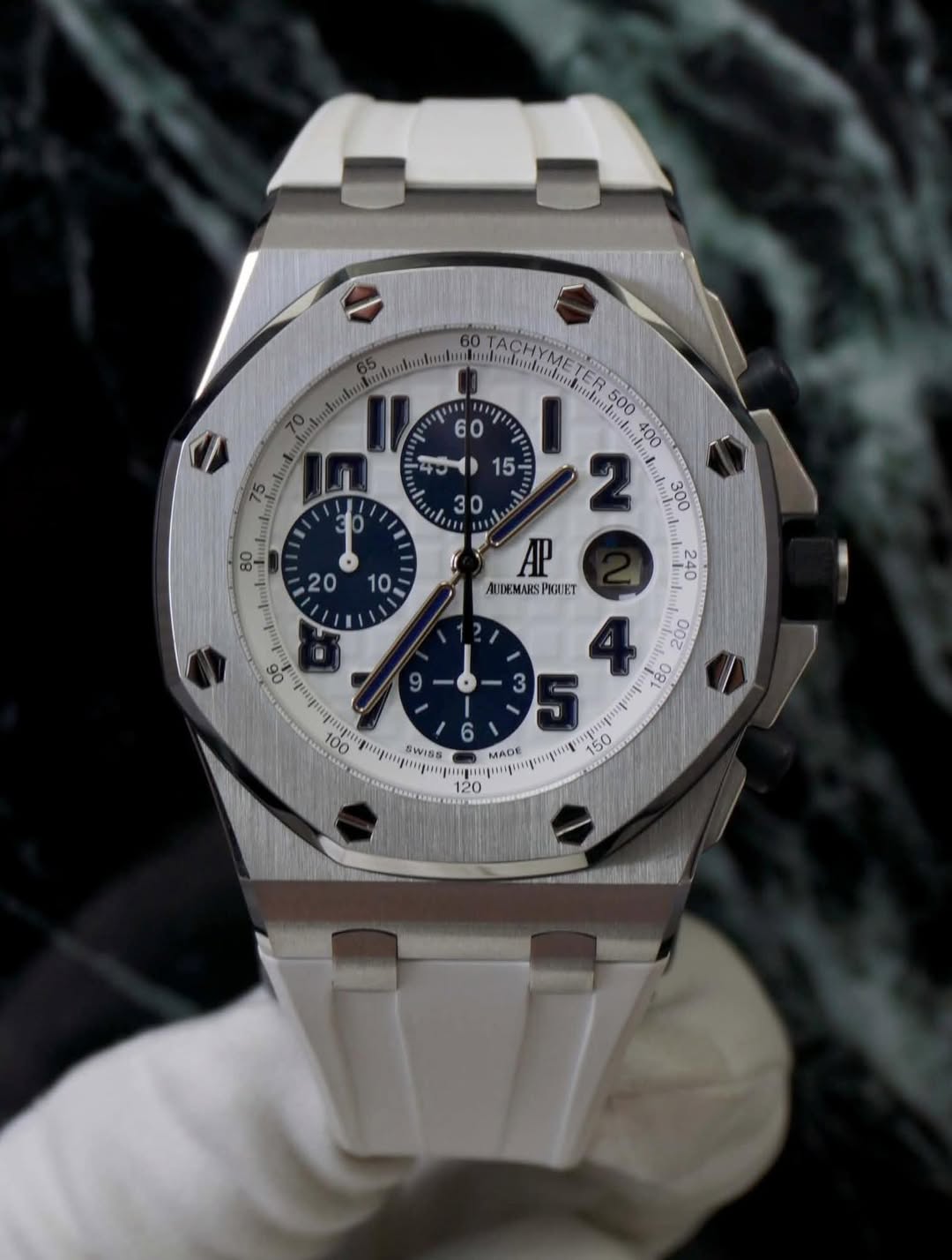 May be an image of wrist watch and text