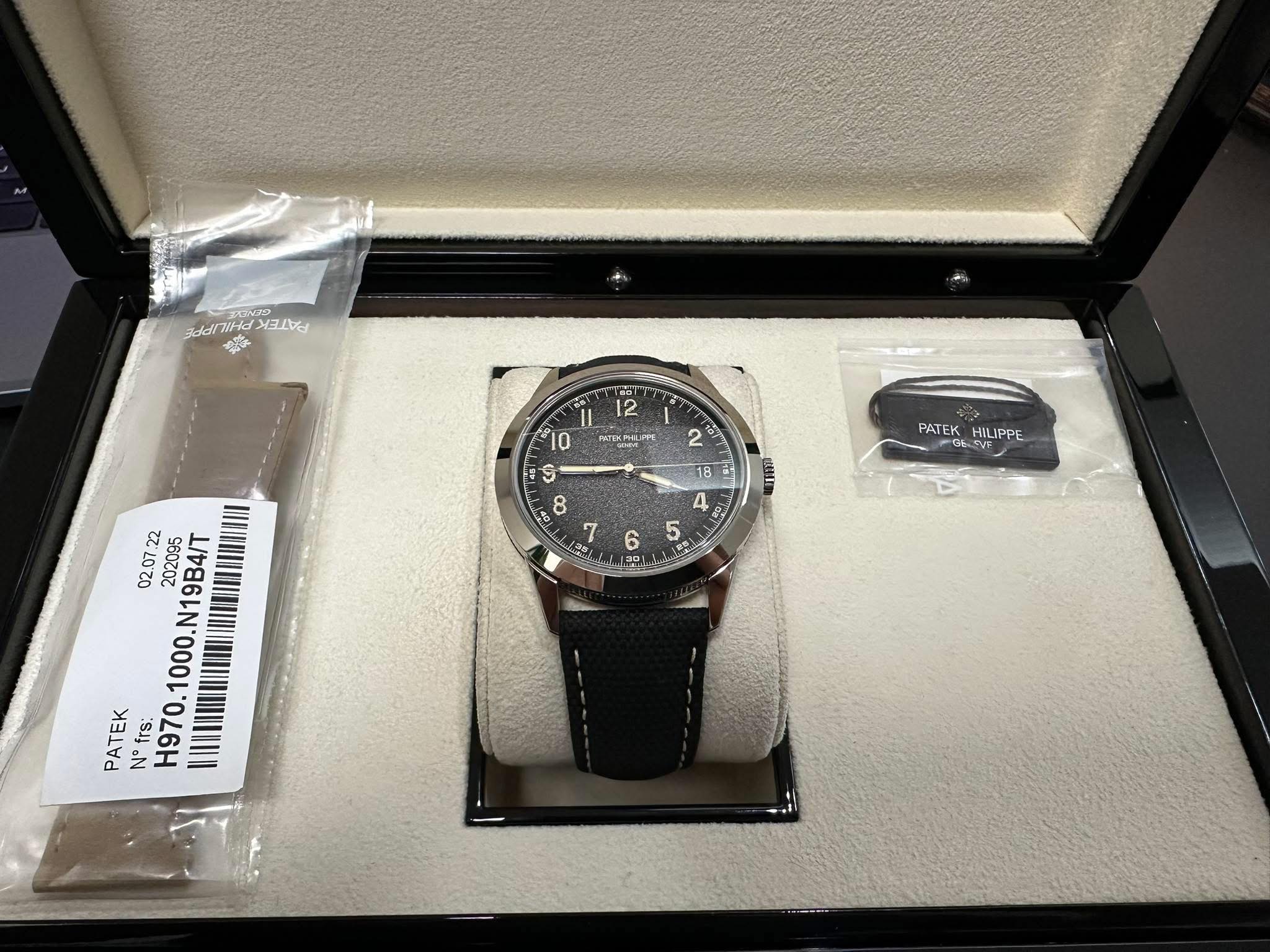 May be an image of wrist watch and text