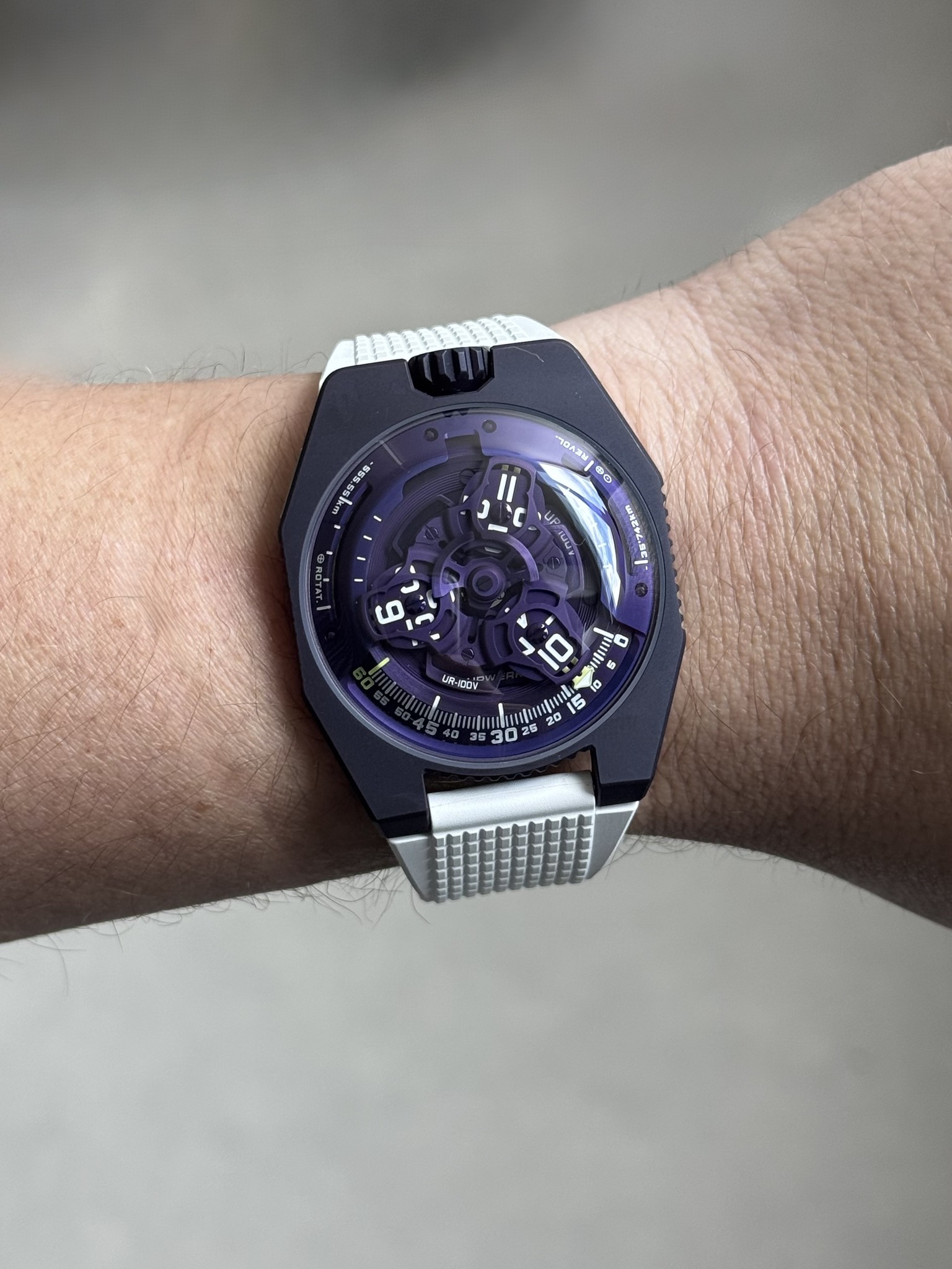 May be an image of wrist watch and text