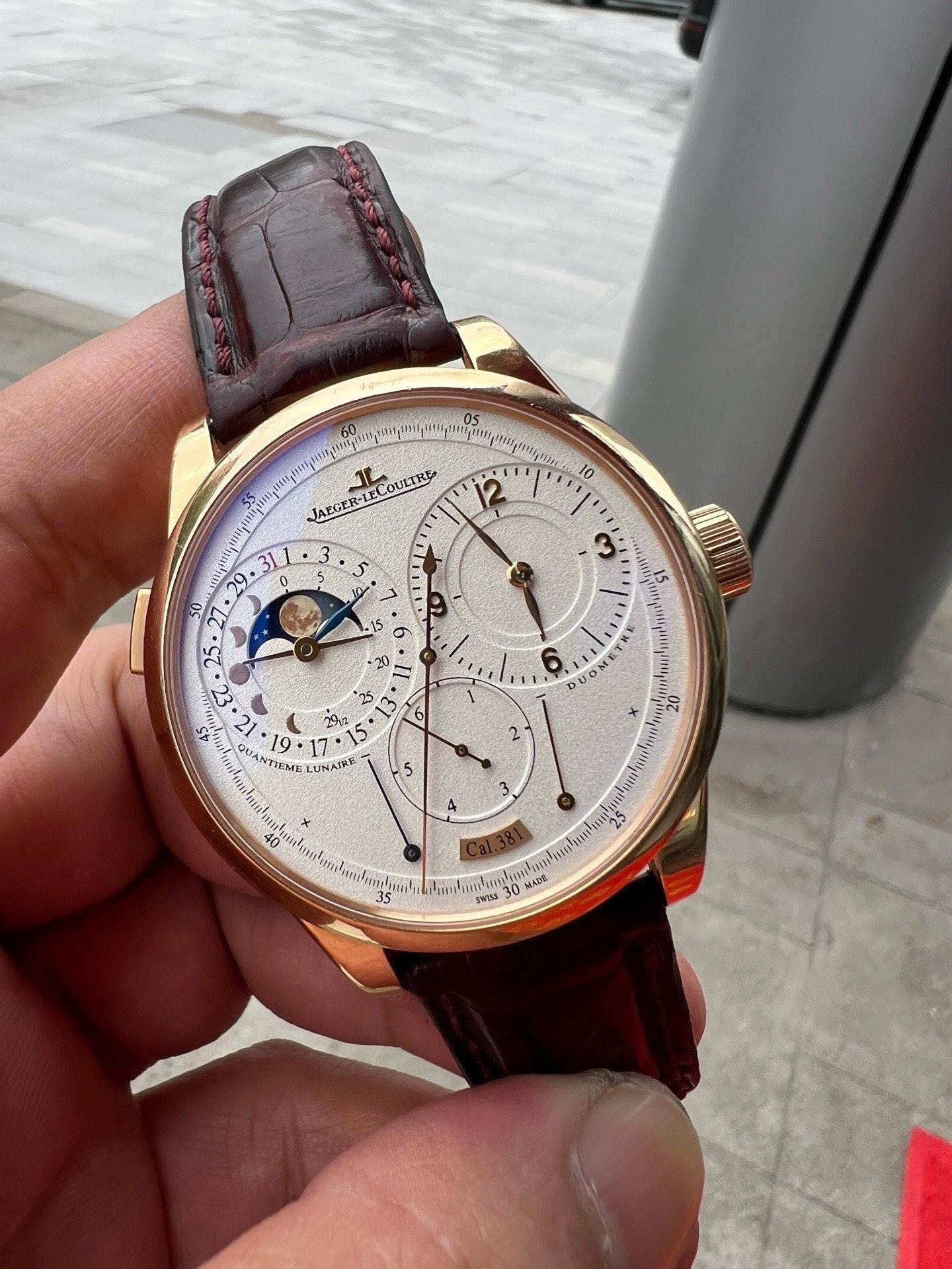 May be an image of wrist watch and text