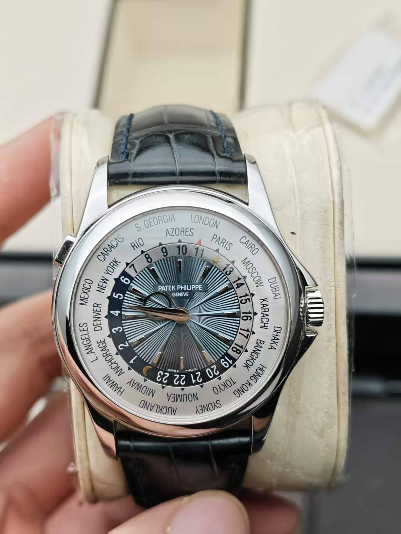May be an image of wrist watch and text that says 'PATEK PHILIPPE GENEVE S. GEORGIA LONDON CARACAS RIO AZORES PARIS CAIRO YORK 8 6 MOSCOW DUBAI ΜΕΧΙΣO NEW 5 お KARACHI DENVER 4 3…