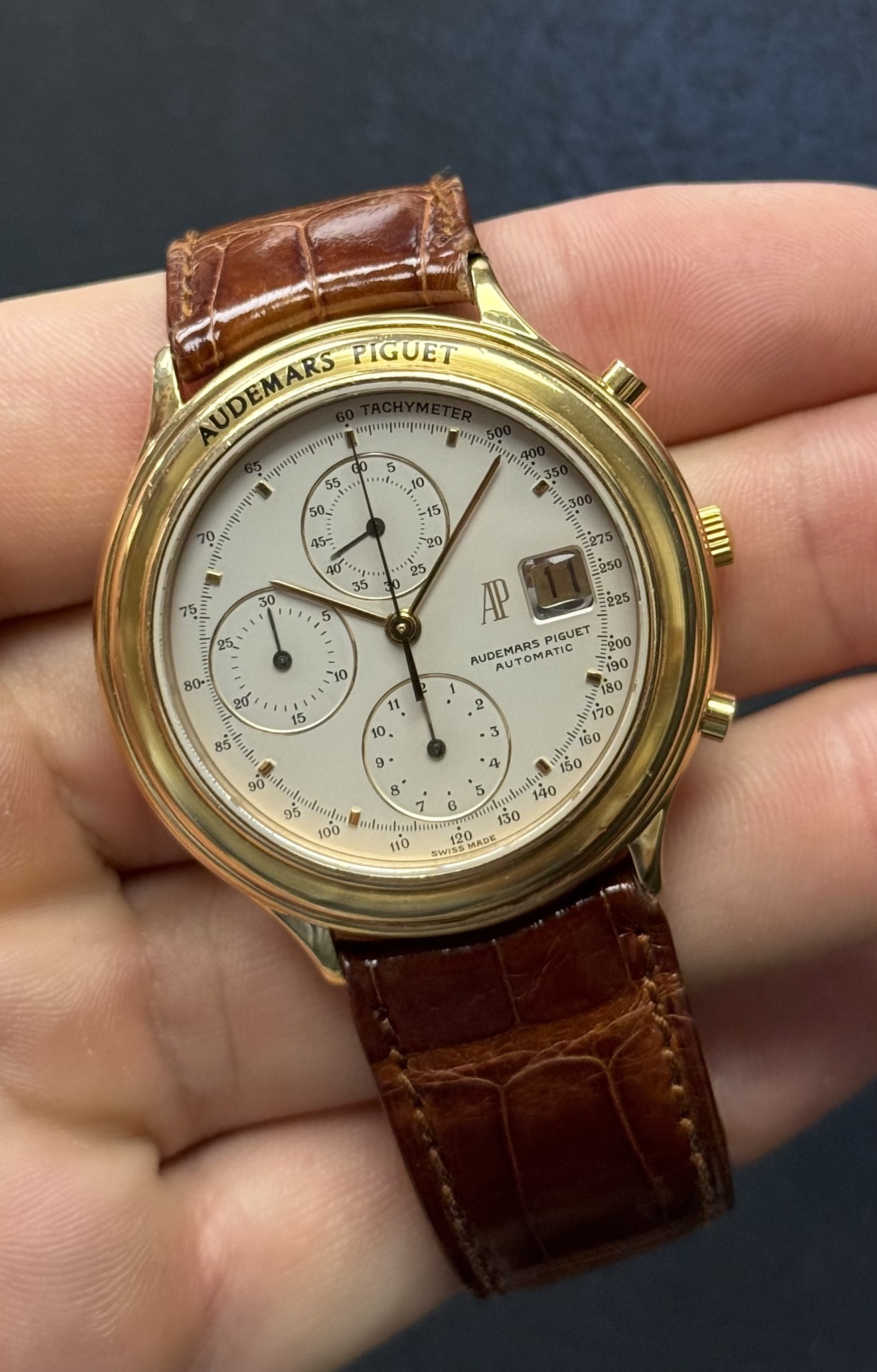 May be an image of wrist watch and text