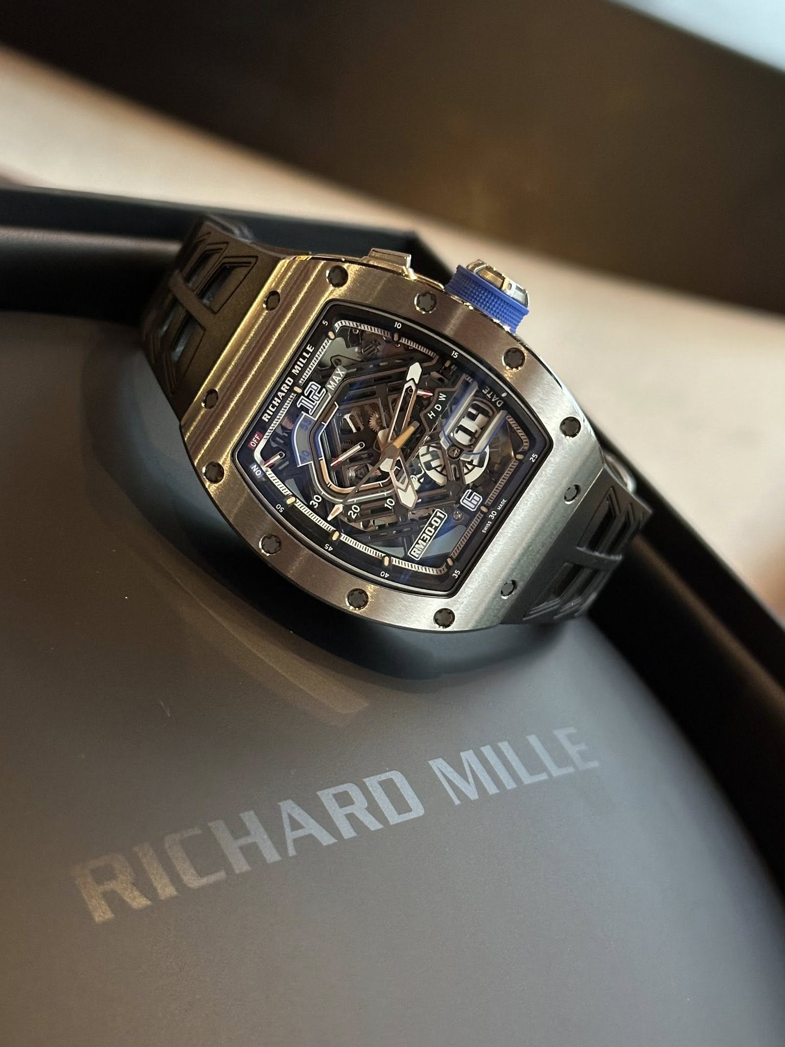 May be an image of wrist watch and text