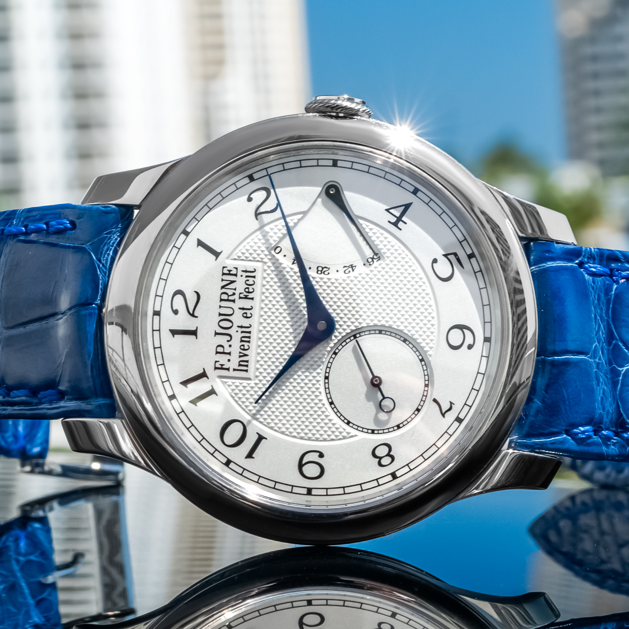 May be an image of wrist watch and text that says '8E টा كو 4 5 2 1 O Fecit 12 .P.JOURNE et Invenit 11 10 ت سکسل ق 9 ኣ 8'