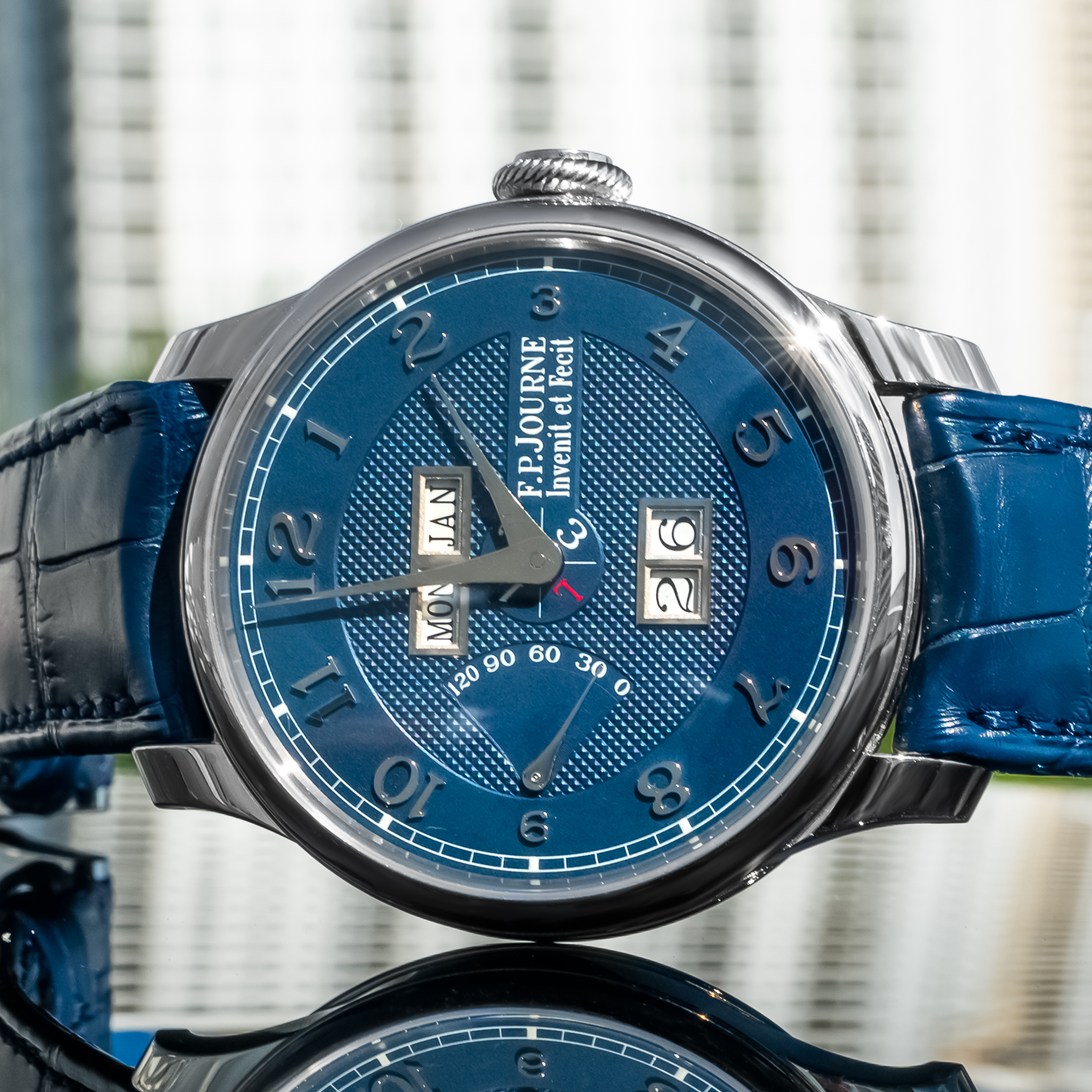 May be an image of wrist watch and text that says 'Pa الطمم 홍종은성 F.P.JOURNE ECR el Fecit Invenit JAN ون MON ا ο فه عنسه ف'