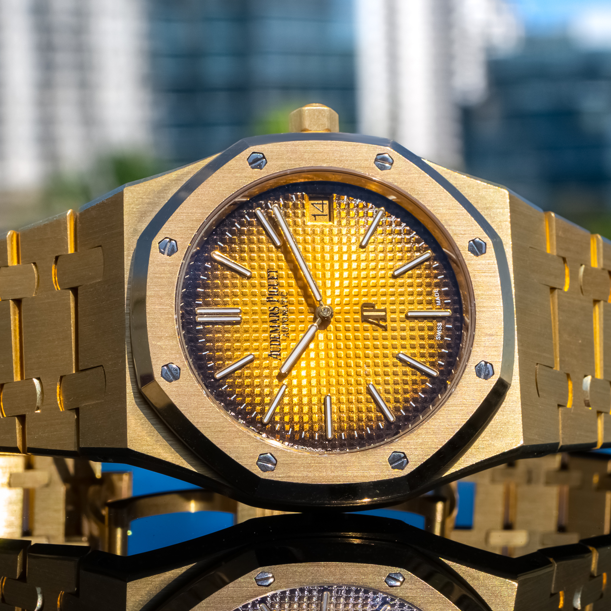 May be an image of wrist watch and text
