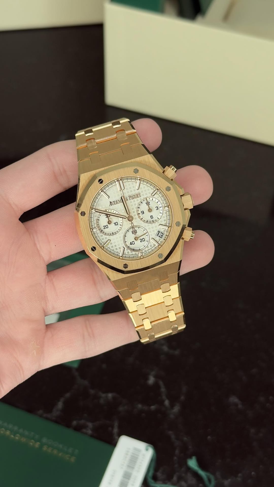 May be an image of wrist watch and text