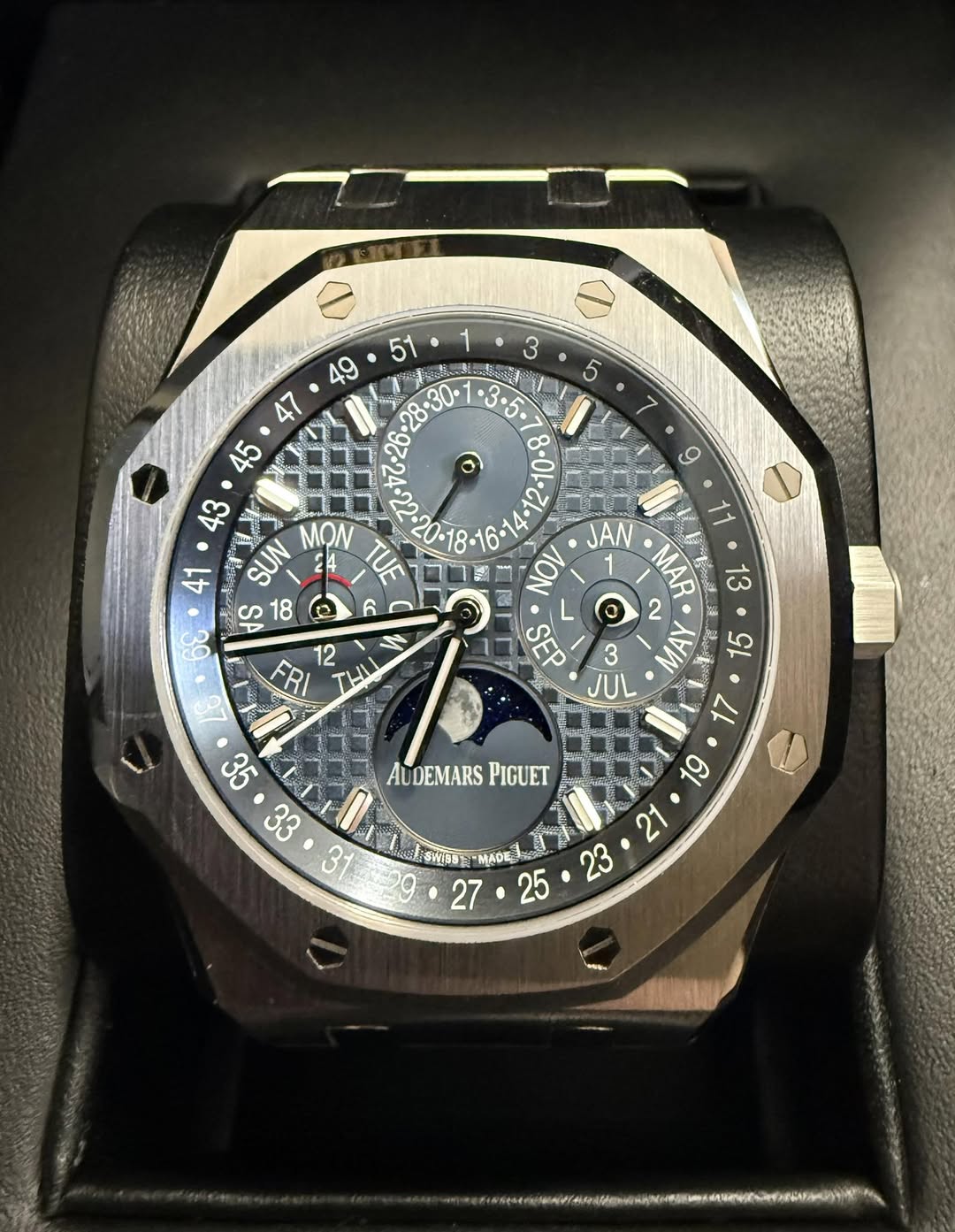 May be an image of wrist watch and text