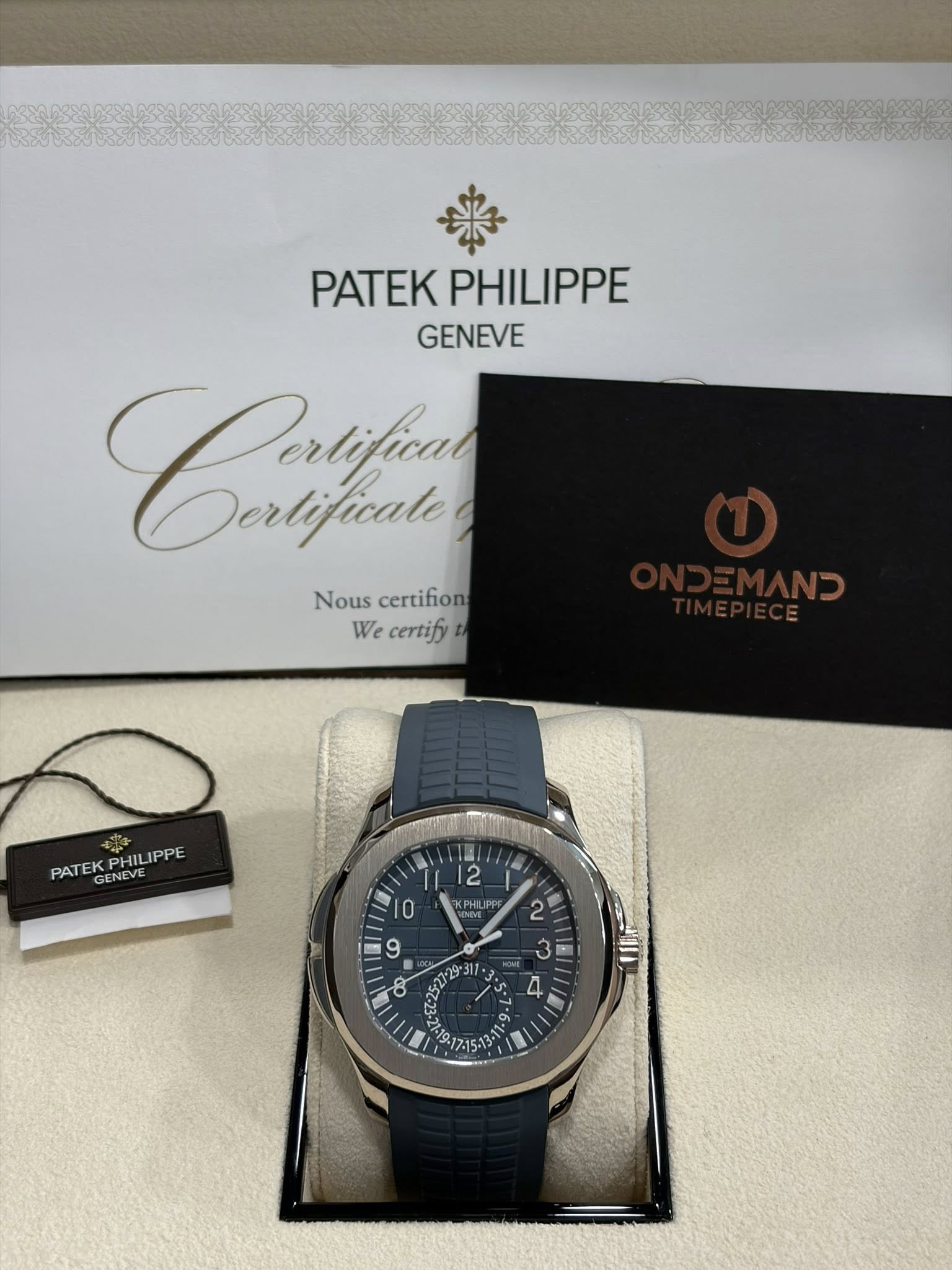 May be an image of wrist watch and text that says 'PATEK PATEKPHILIPPE PHILIPPE GENEVE Carlfer Dertificale Nous certifione Wecentify: We certify ርሱ PATEK PATEKPHILIPPE PHIL…
