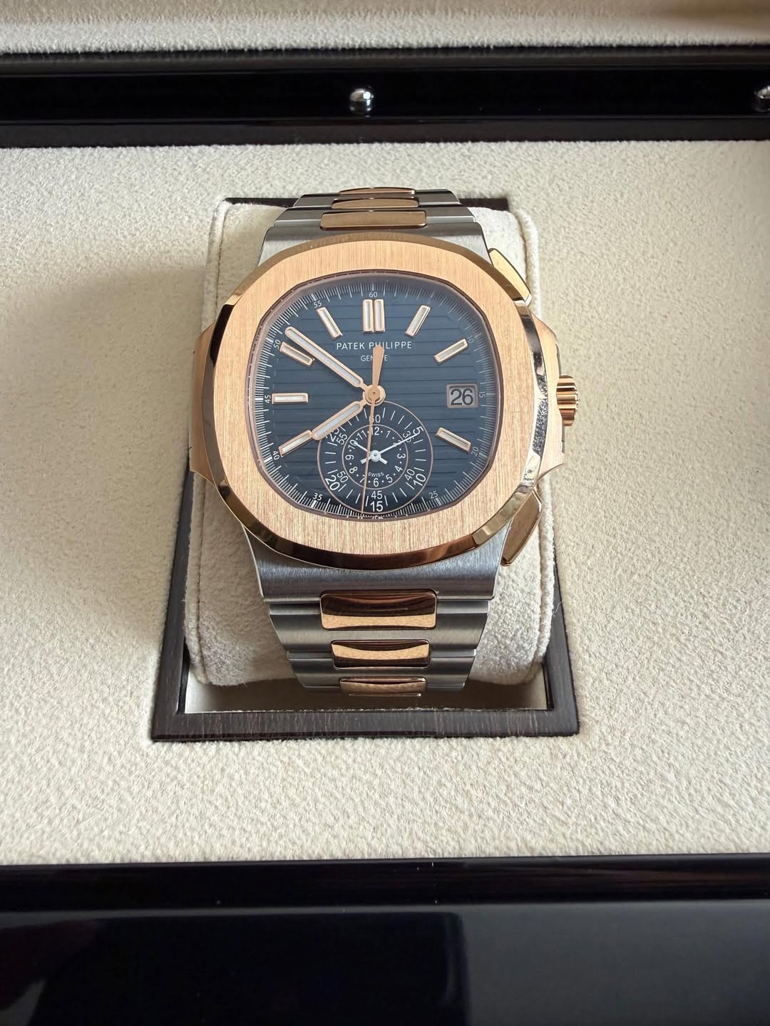May be an image of wrist watch and text