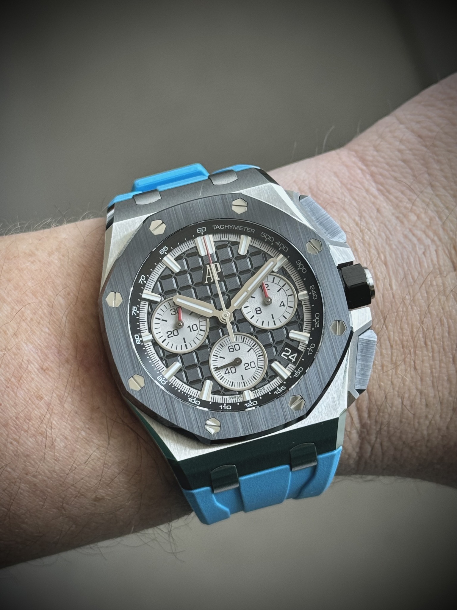 May be an image of wrist watch and text