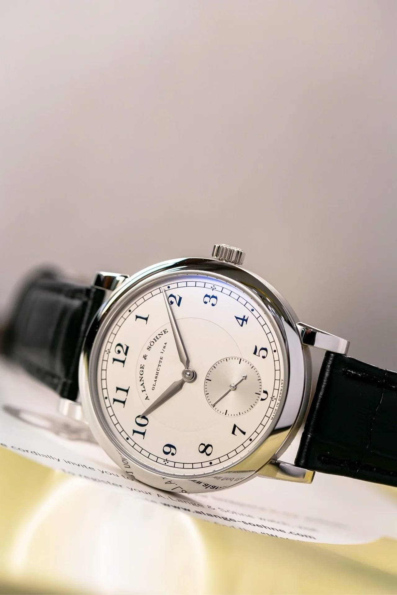 May be an image of wrist watch and text
