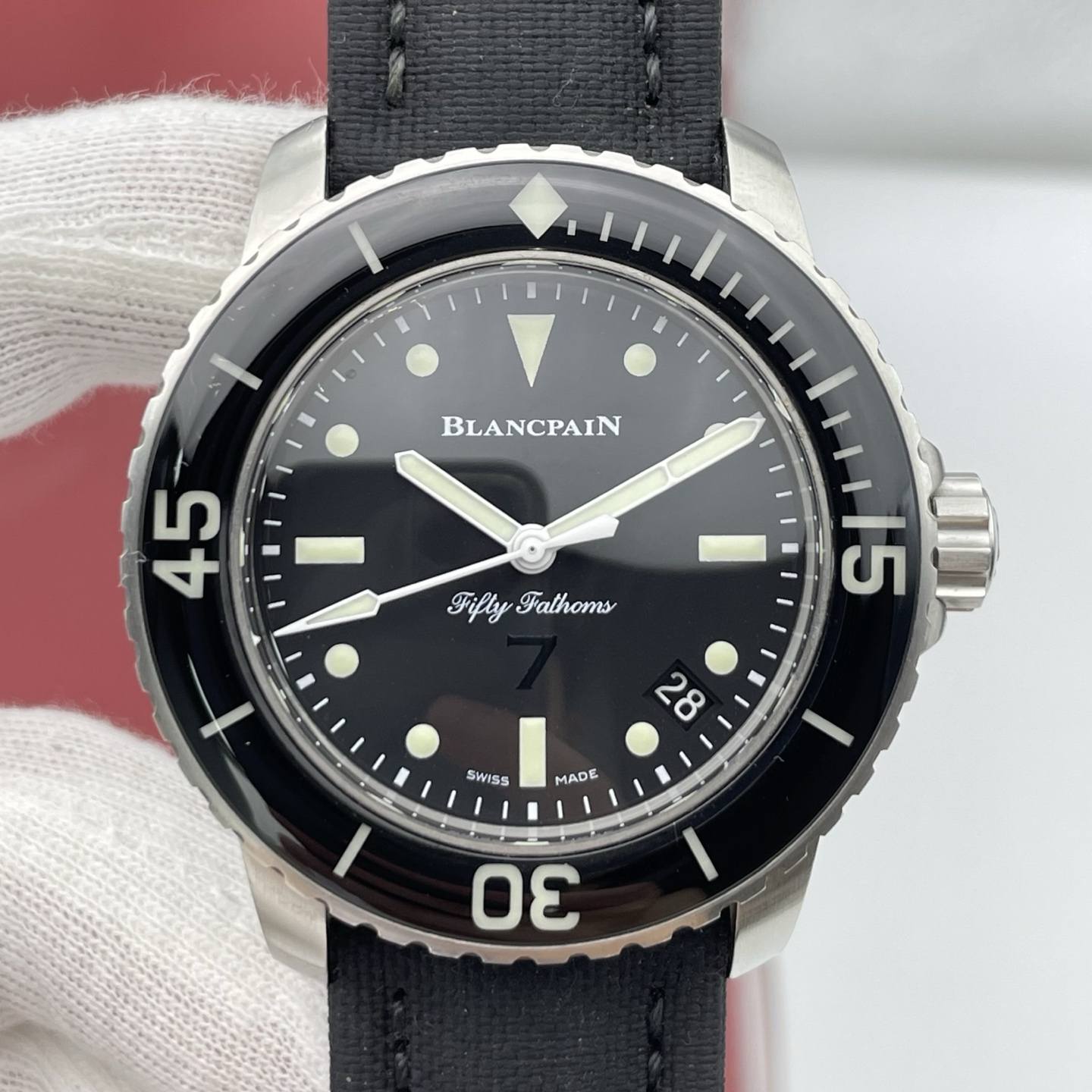 May be an image of wrist watch and text that says '١ BLANCPAIN y FiflyFalhoms Fathoms 45 十 511 5 28 SWISS MADE 1 30 ဟ'