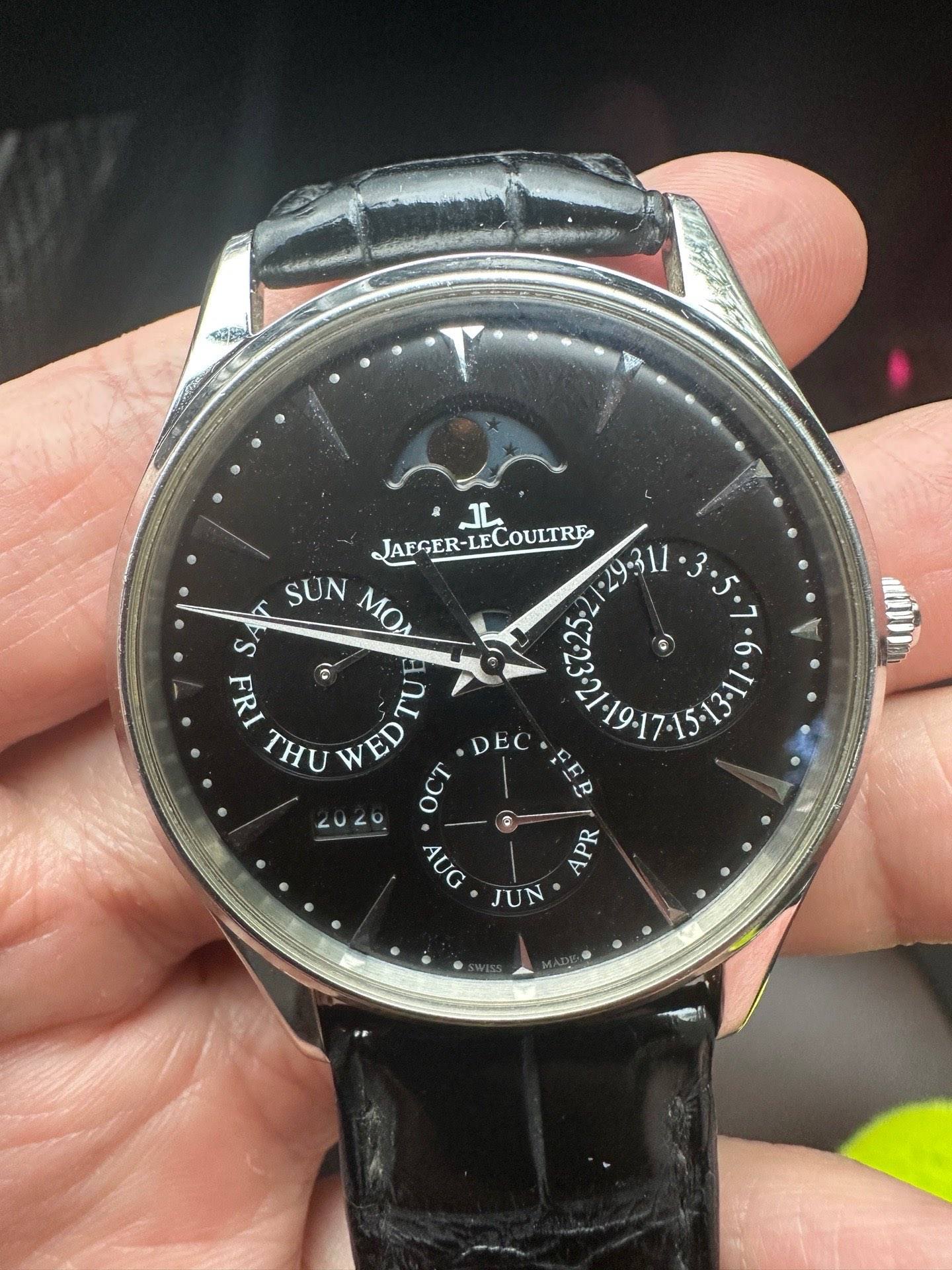 May be an image of wrist watch and text