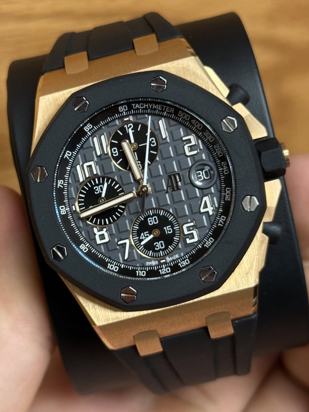 May be an image of wrist watch and text