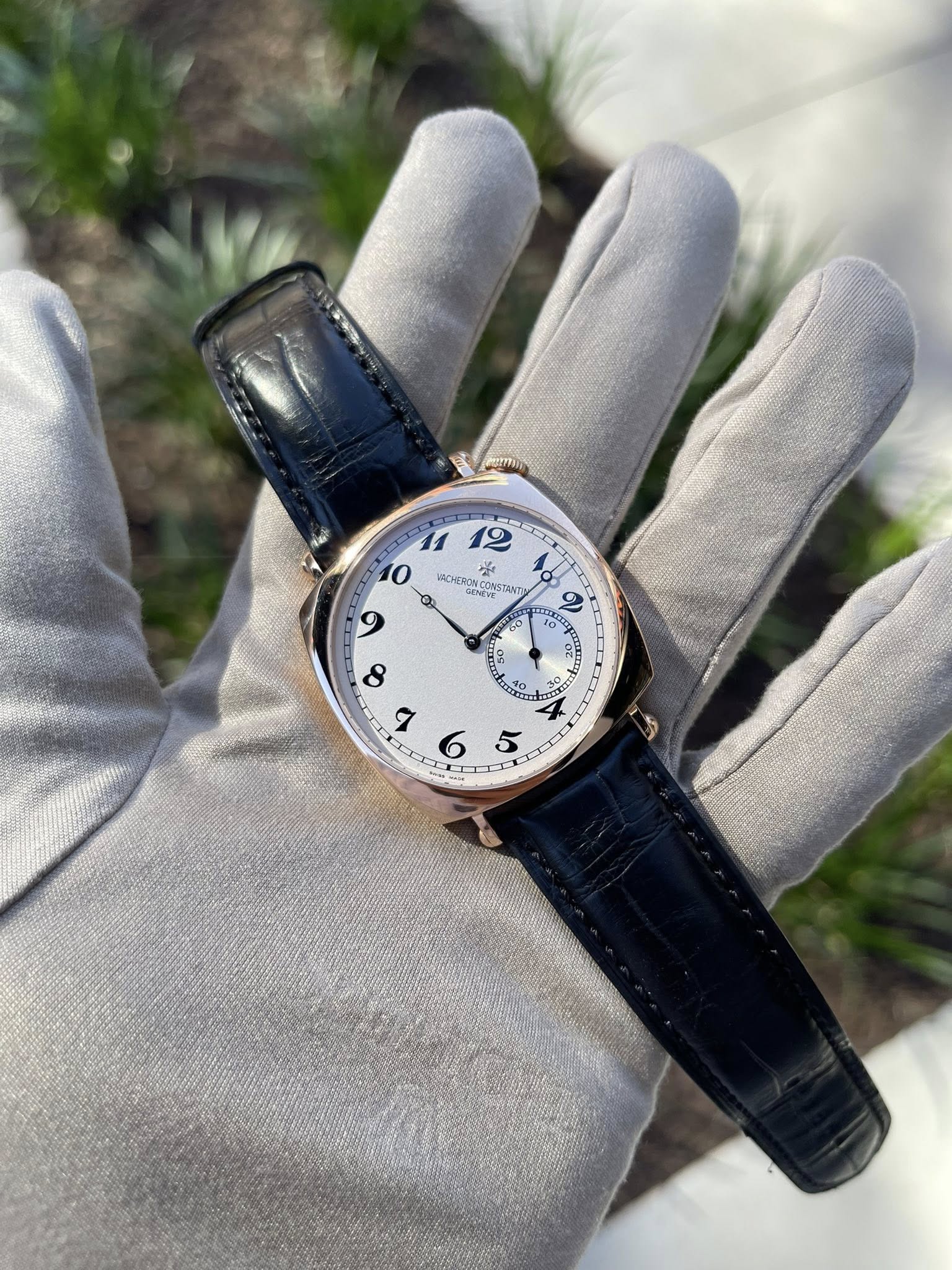 May be an image of wrist watch and text