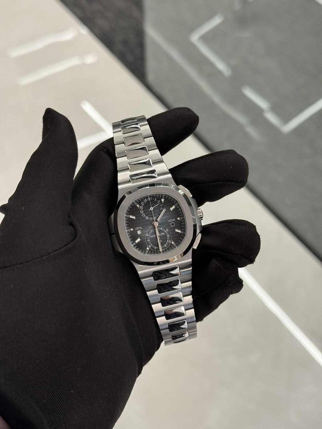 May be an image of wrist watch and text