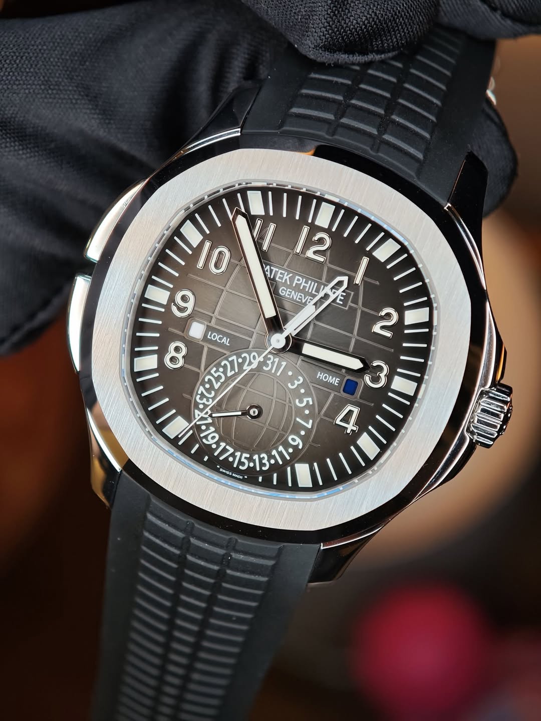 May be an image of wrist watch and text