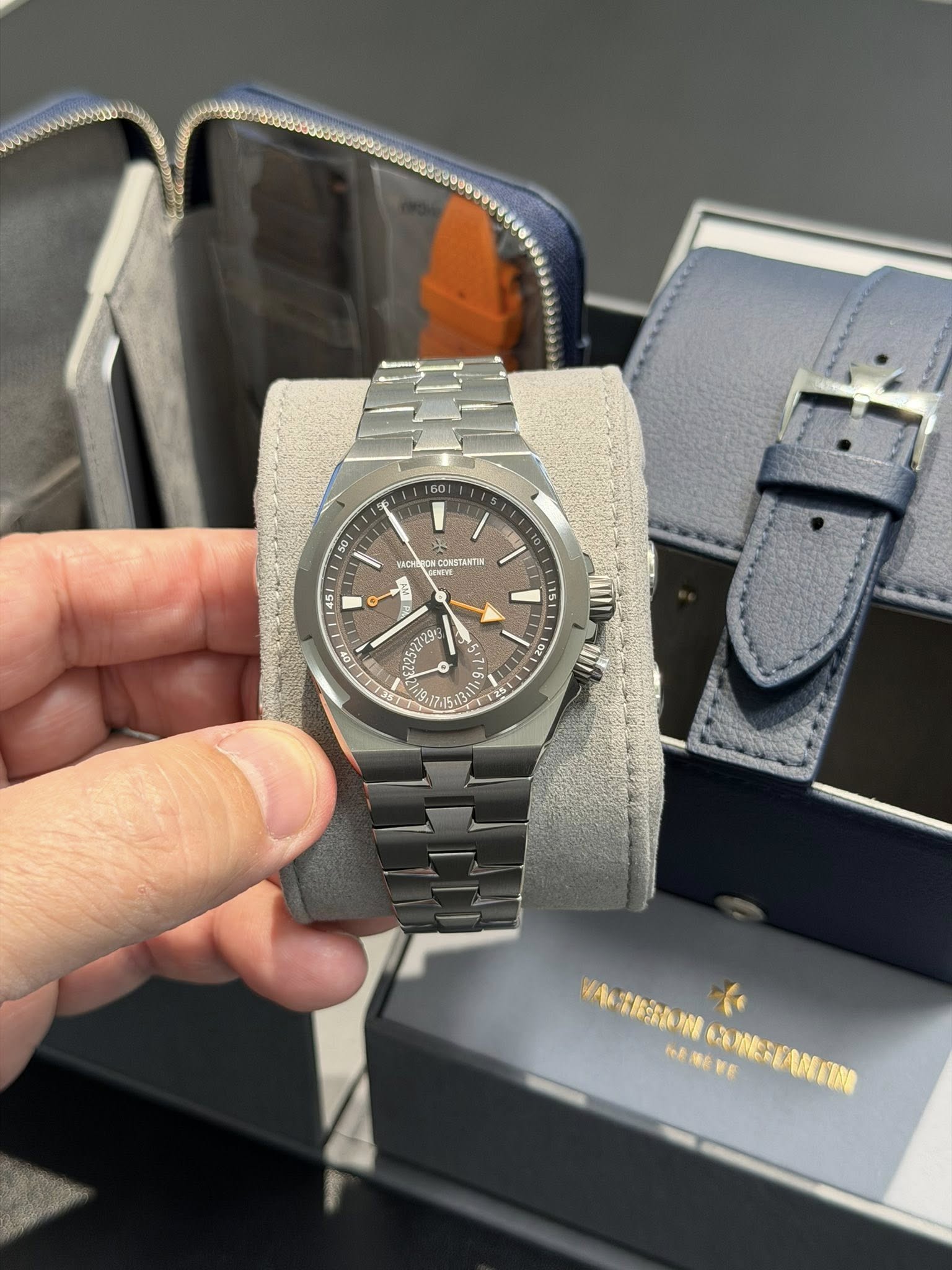 May be an image of wrist watch and text