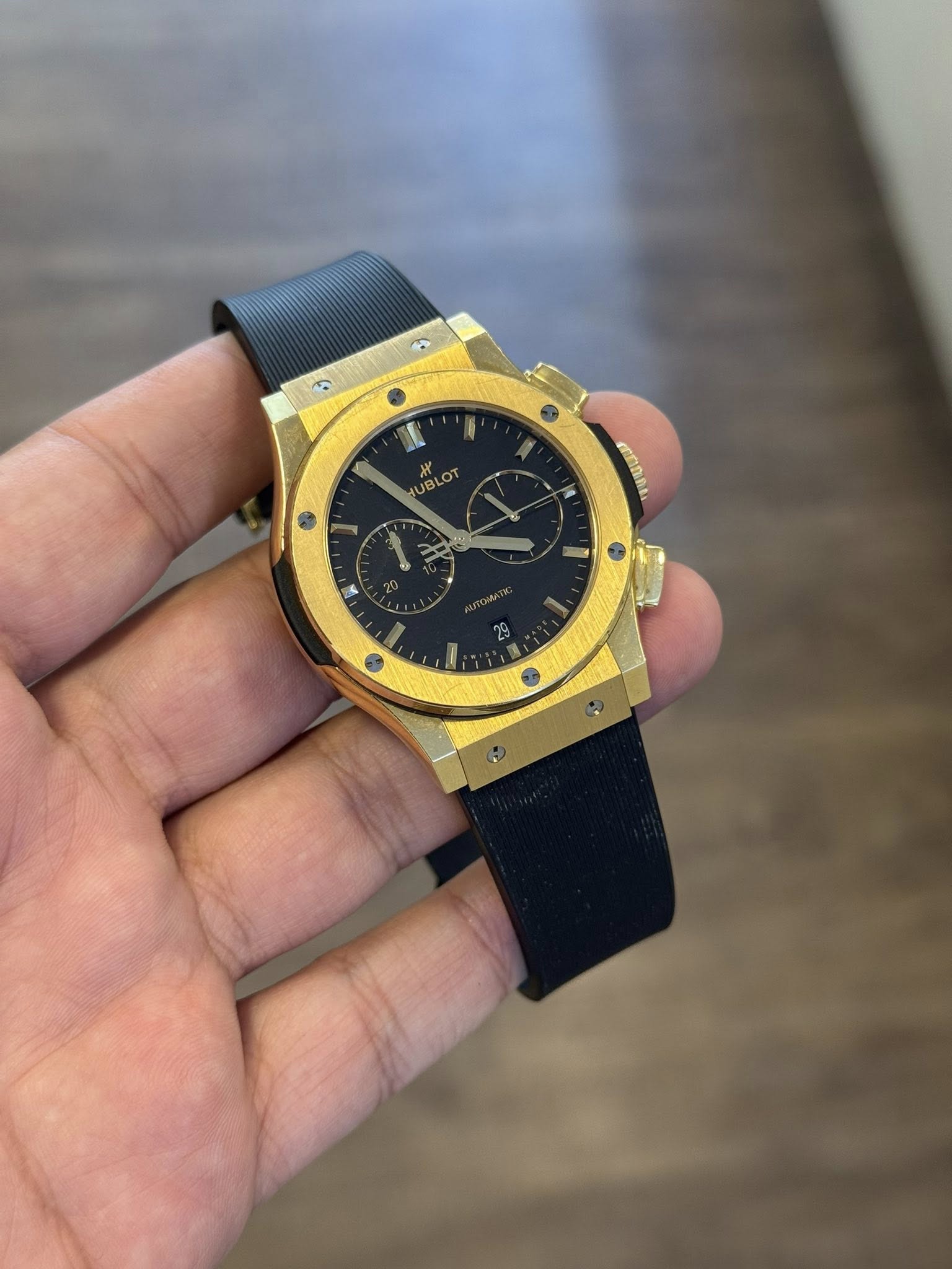 May be an image of wrist watch and text