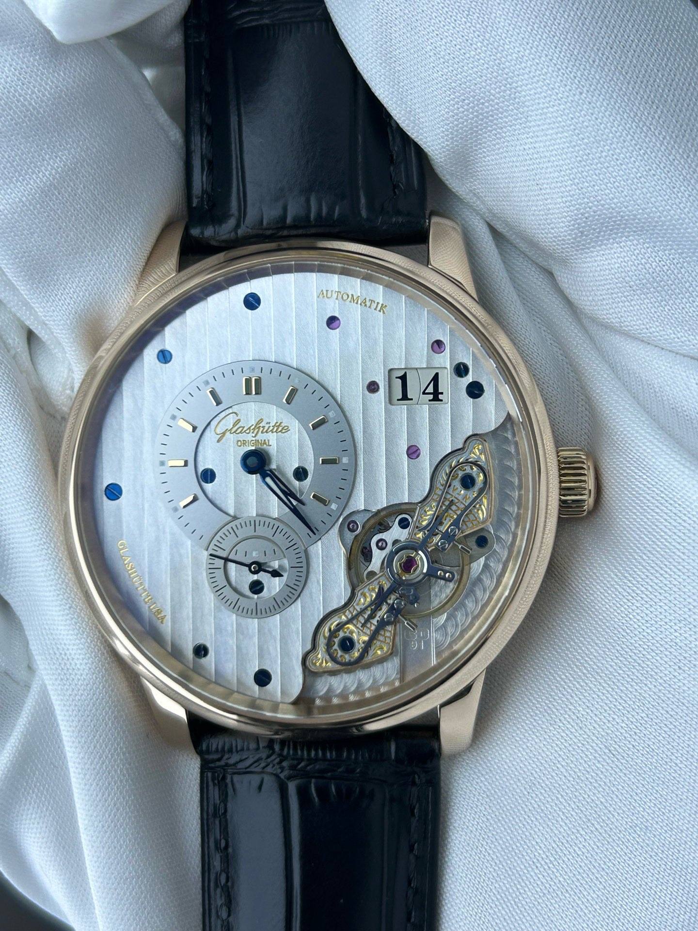 May be an image of wrist watch and text that says 'AUTOMATIK ca6лий ütte ORIG ORIGNAL NAL 14 L แท: IE I יימייין I'