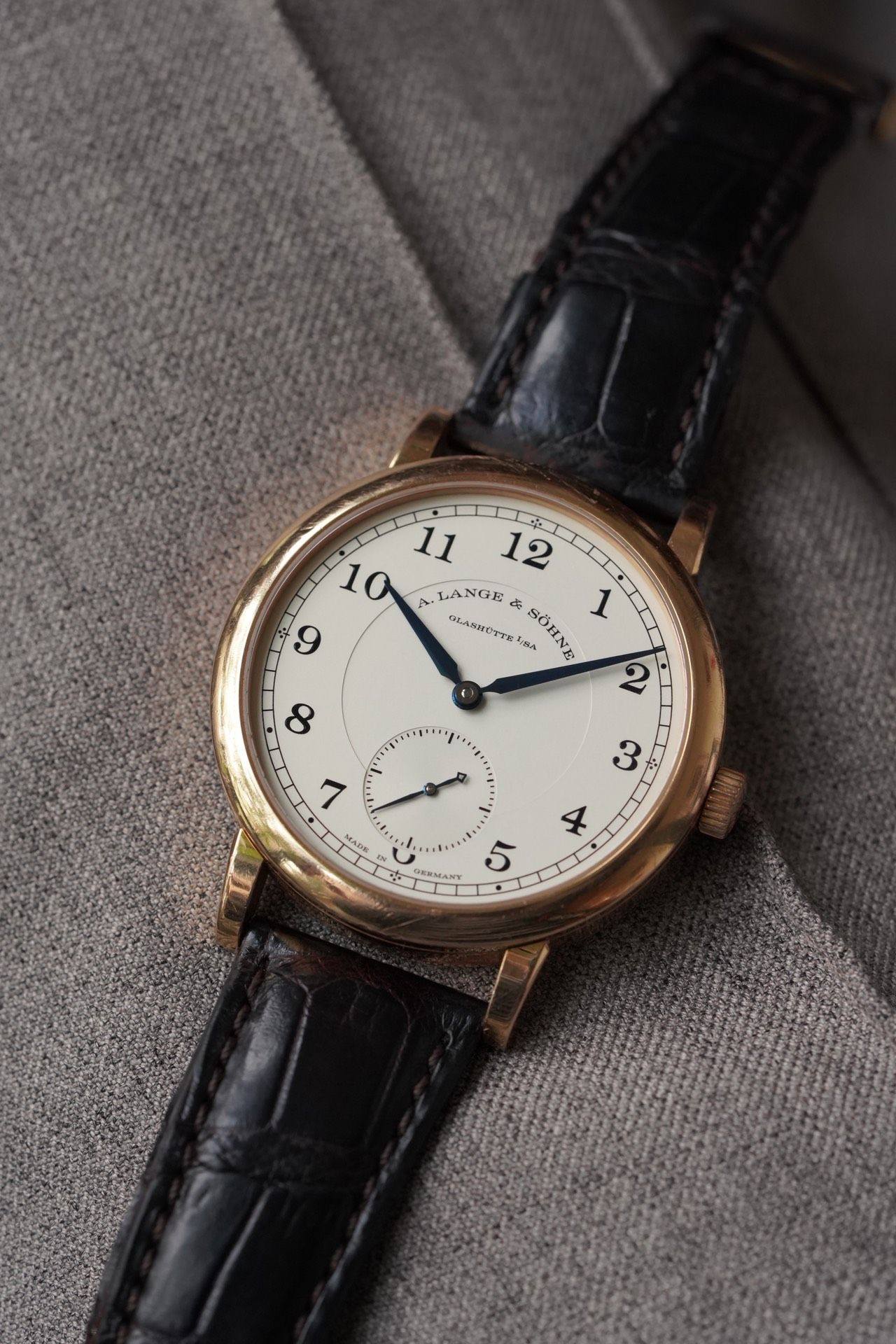 May be an image of wrist watch and text