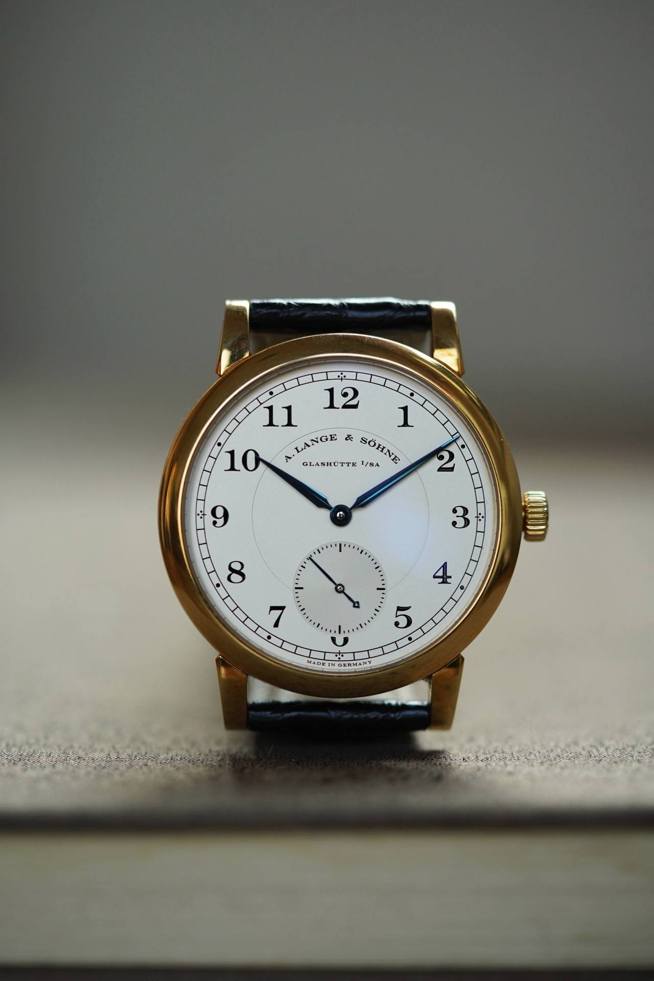 May be an image of wrist watch and text
