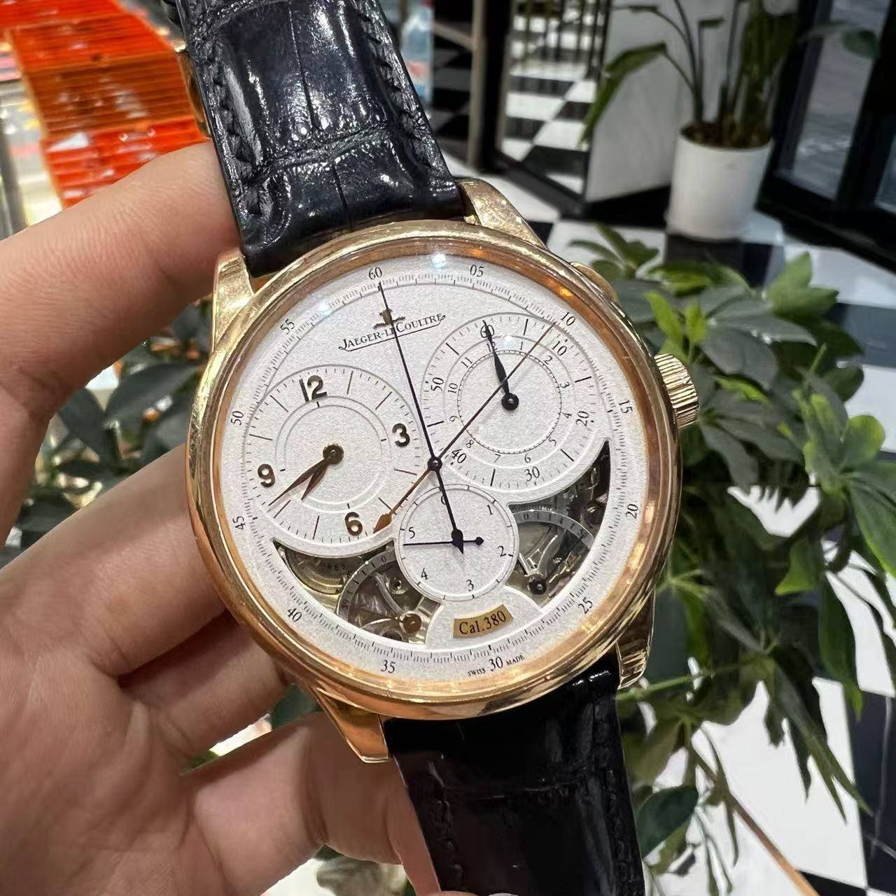 May be an image of wrist watch and text