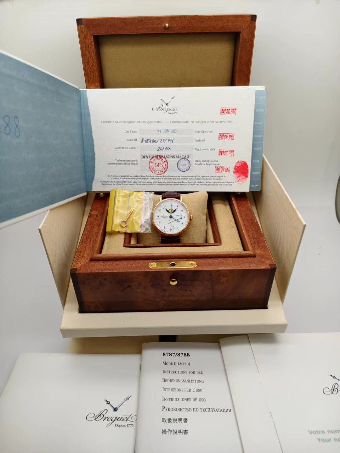 May be an image of wrist watch and text