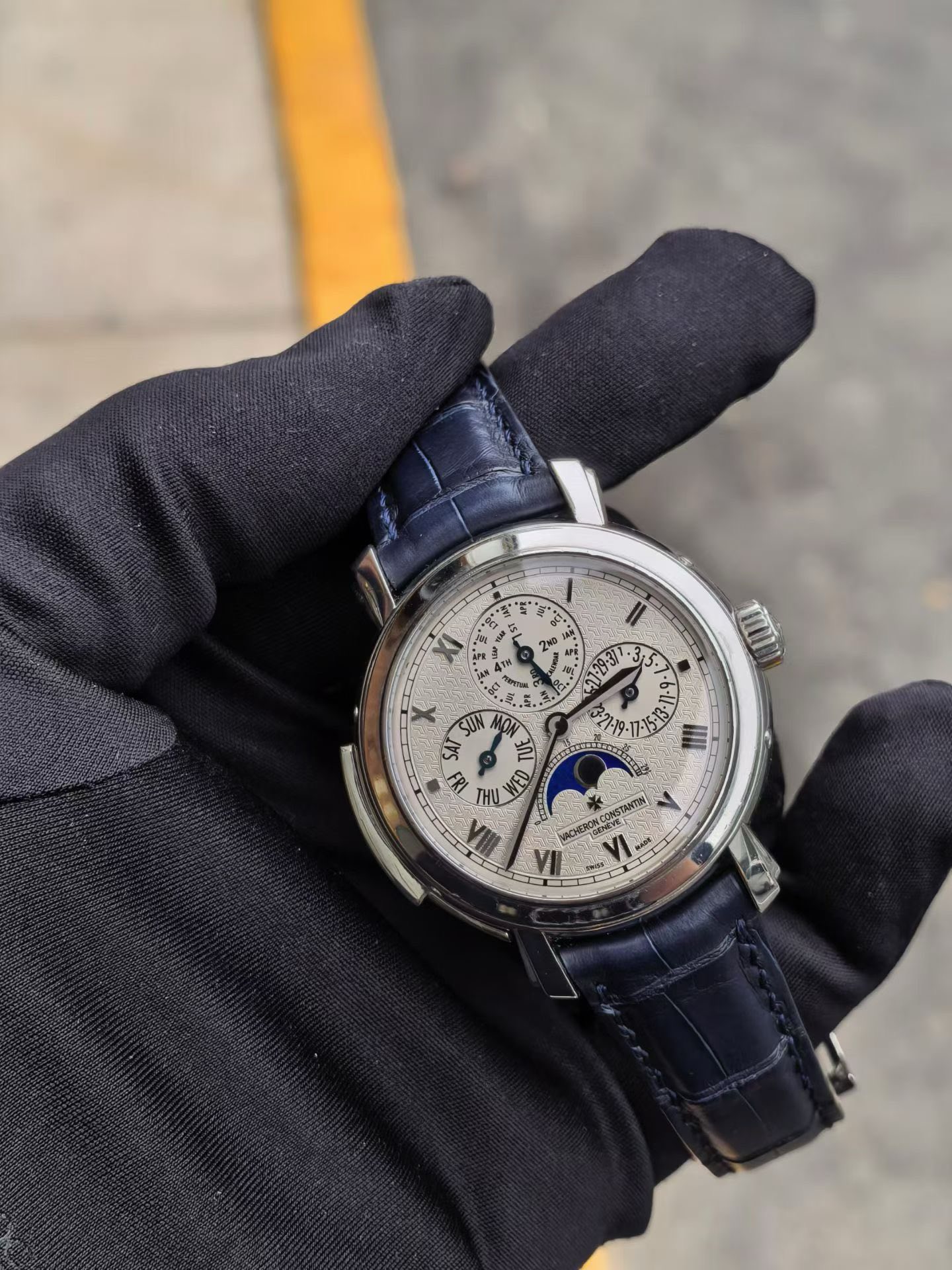 May be an image of wrist watch and text