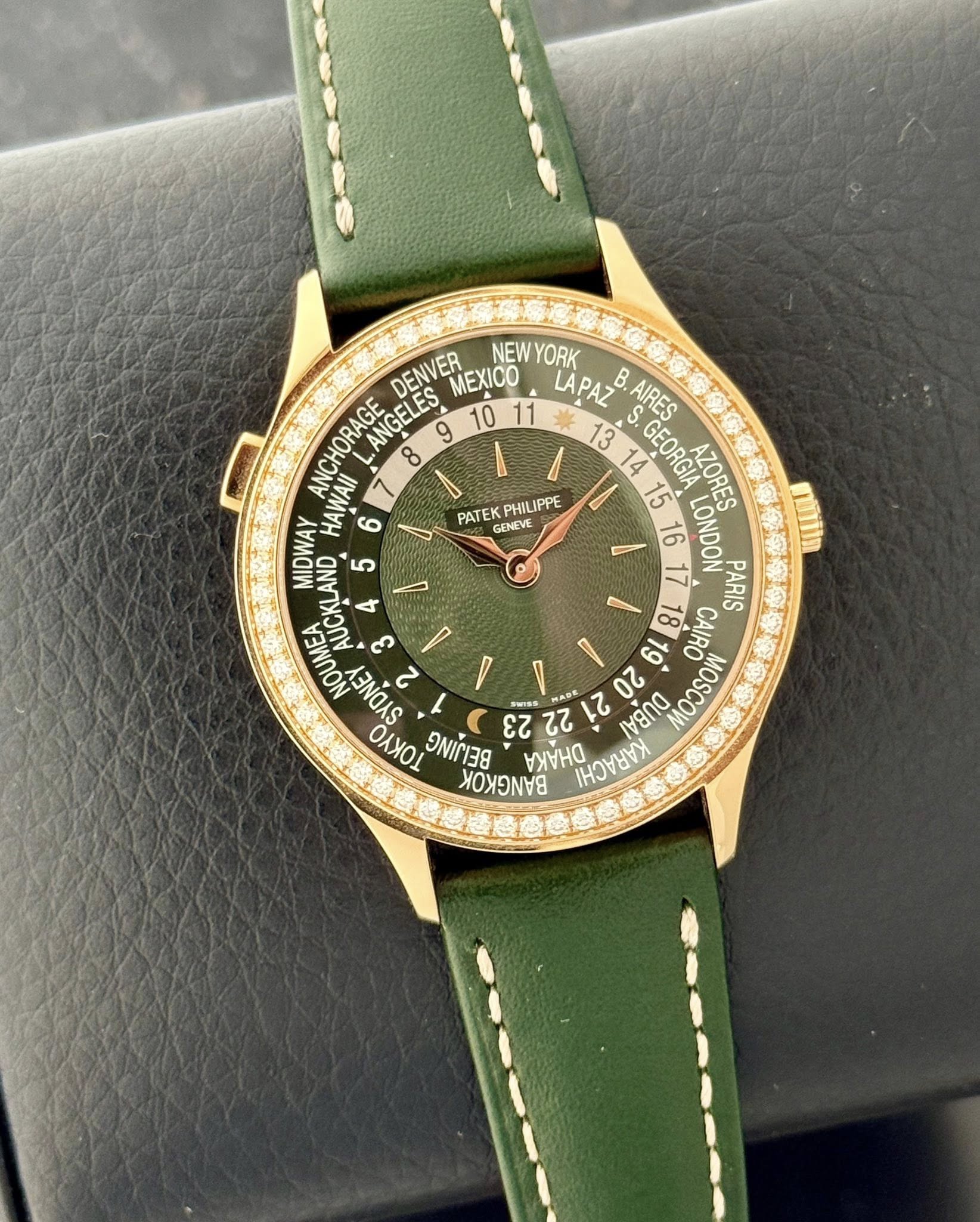 May be an image of wrist watch and text that says 'PATE KP PHILIPPE GENEVE DENVER MEXICO 11 LAPAZ B B NEWYORK ANCHORAGE ANGELES A . S. AIRES HAWAII 6 14 GEORGIA 15 MIDWAY 5 16 17…
