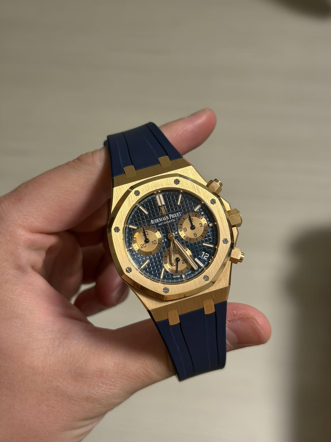 May be an image of wrist watch and text
