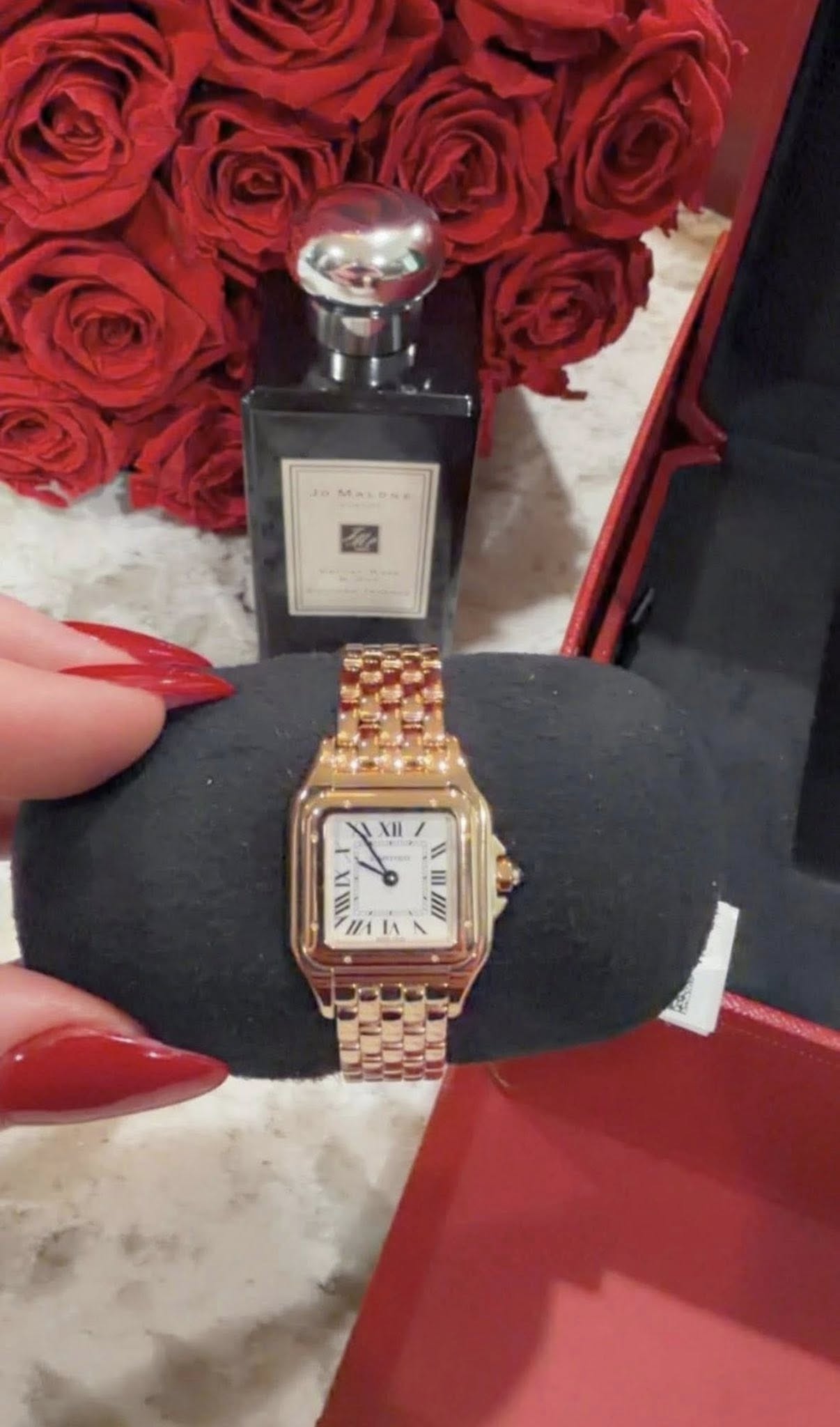 May be an image of wrist watch, fragrance and text