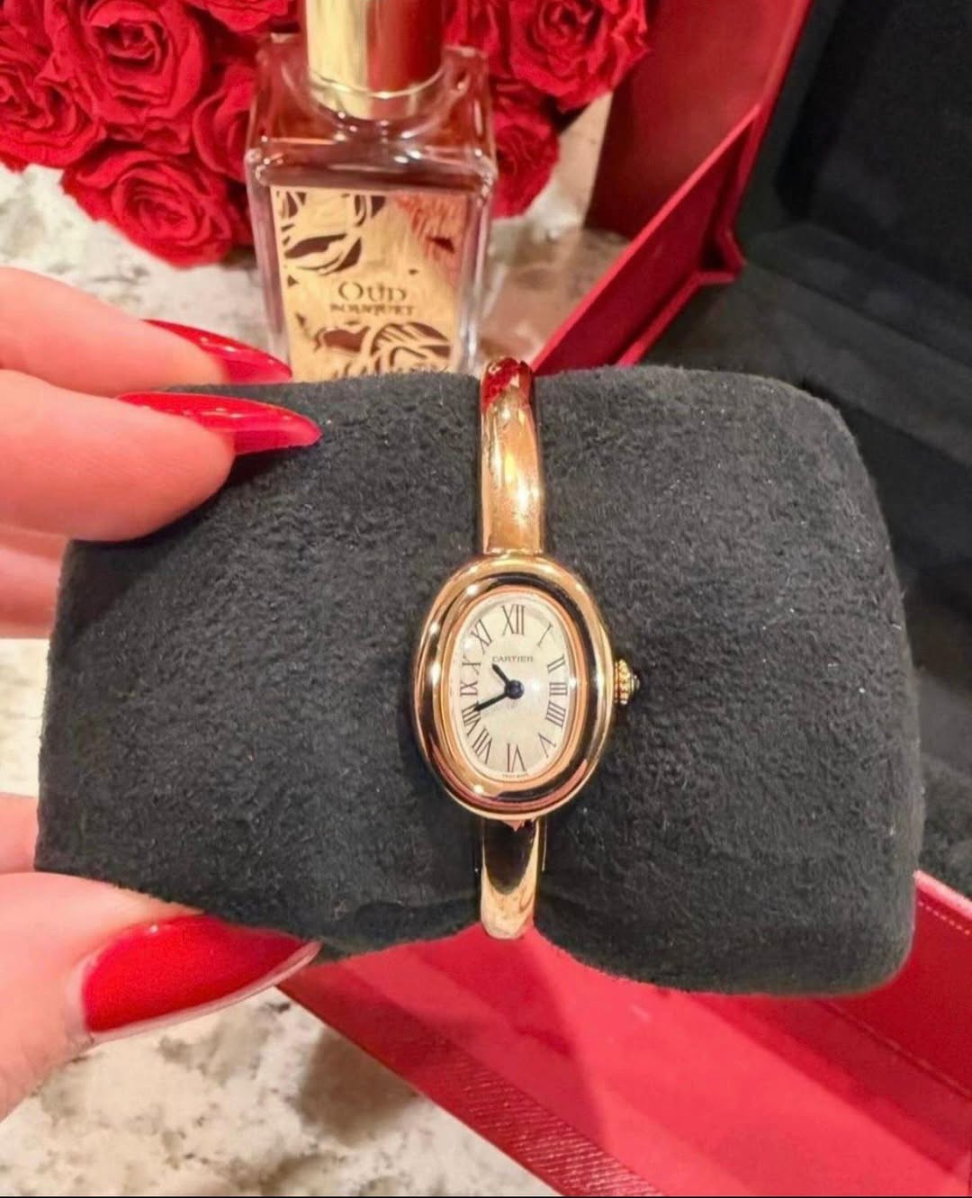 May be an image of wrist watch and text