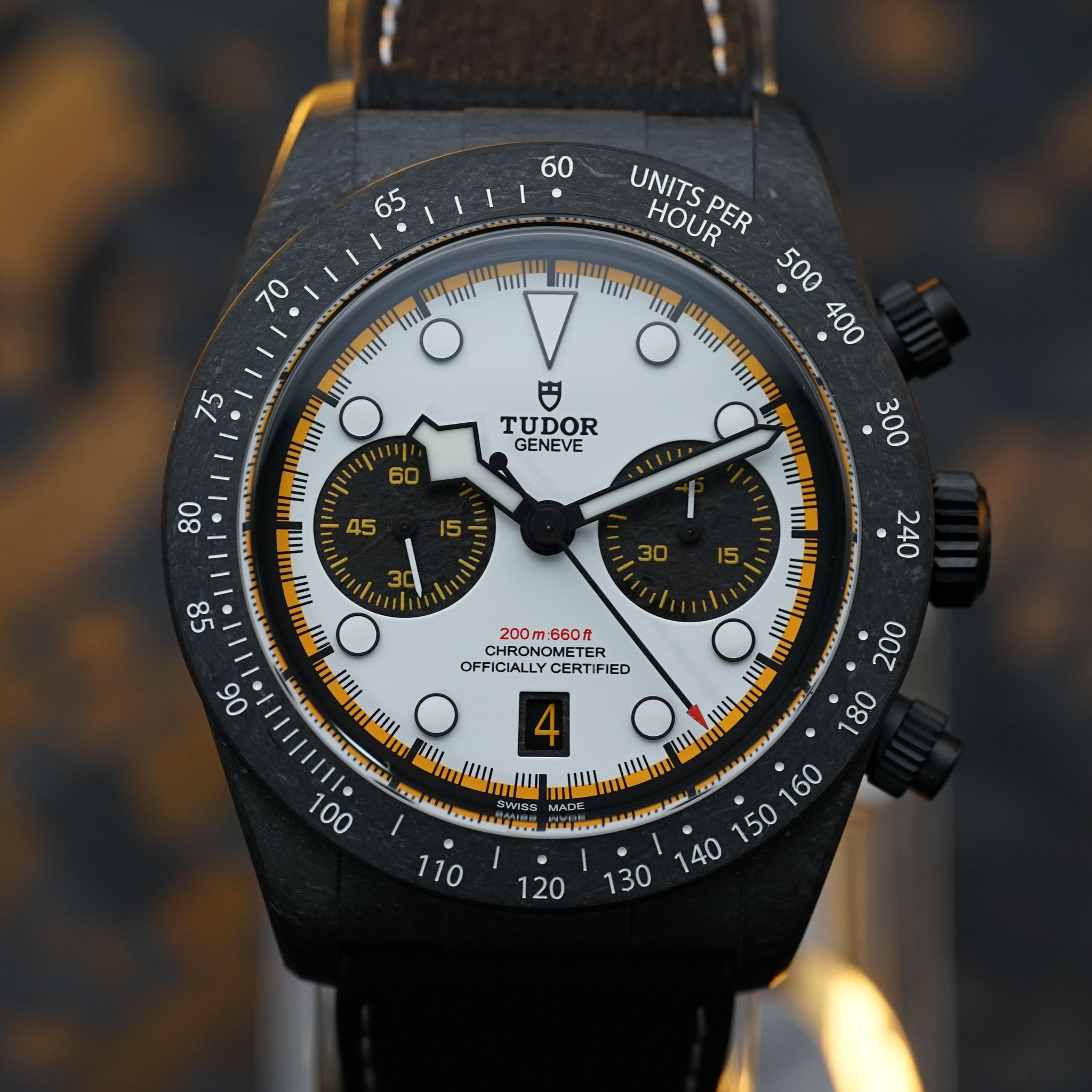 May be an image of wrist watch and text that says '60 65 70 uITT "i ''"α m 1L UNITS HOUR PER AOR 500 "Iiml 400 il" II "กม و TUDOR mI m I! IIII 川 pa 100 200m:660 CHRON CHRONG…