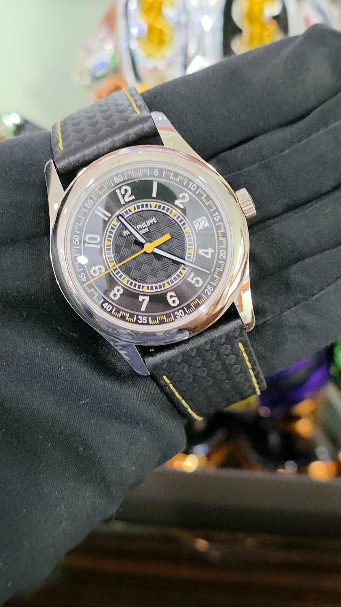 May be an image of wrist watch and text