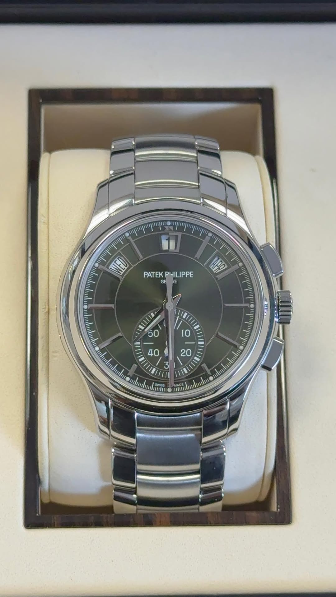 May be an image of wrist watch and text