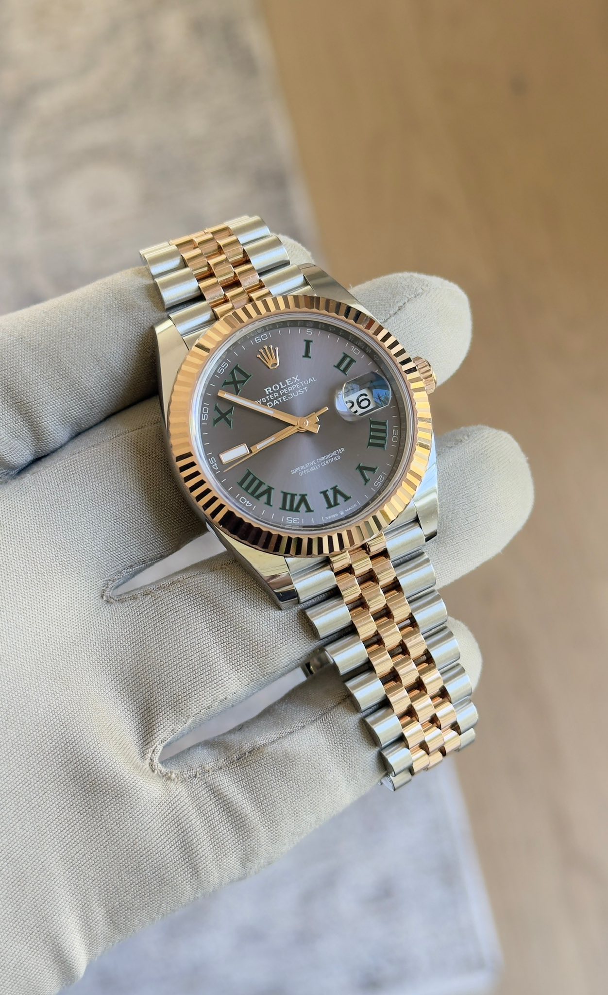 May be an image of wrist watch and text