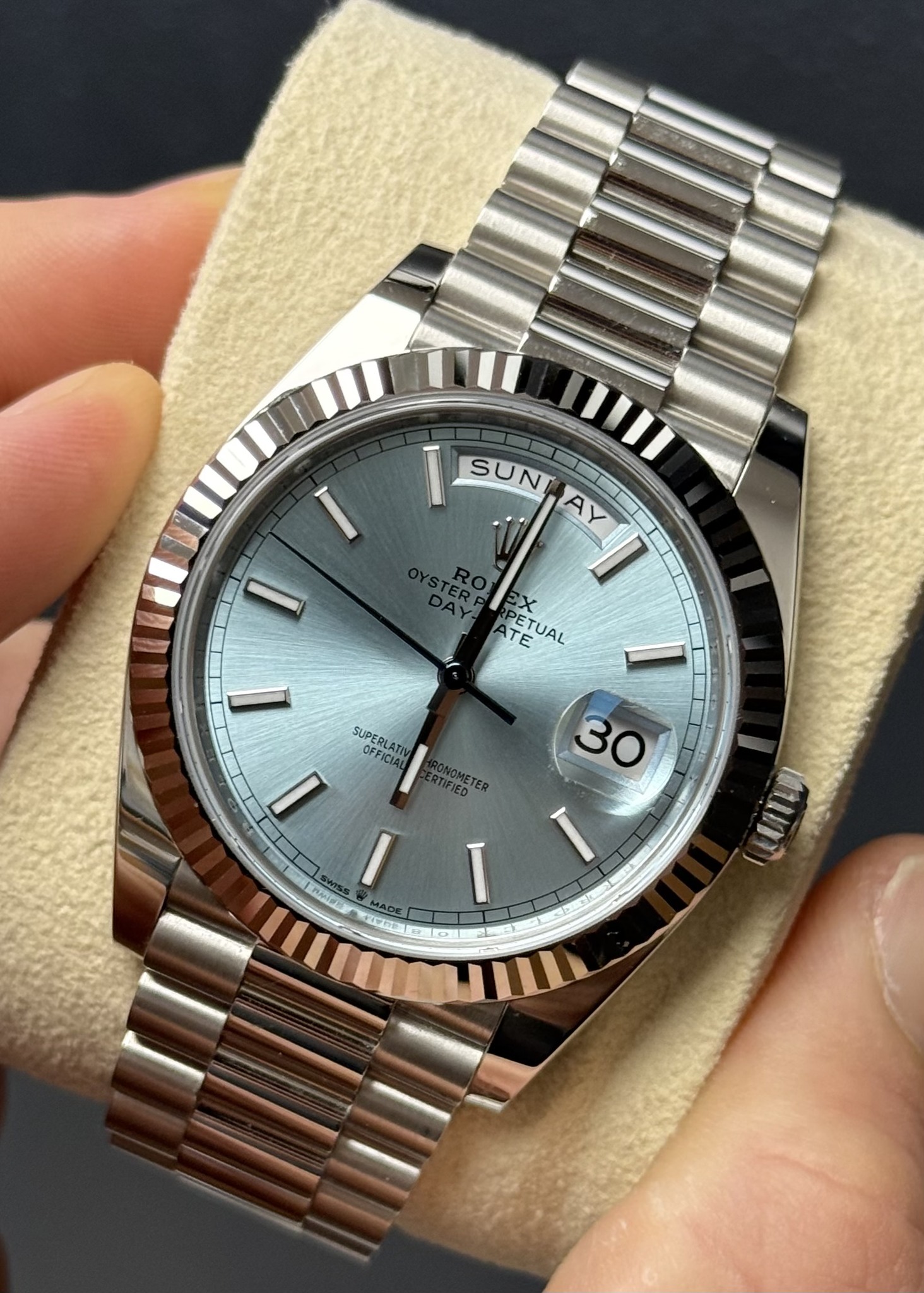 May be an image of wrist watch and text