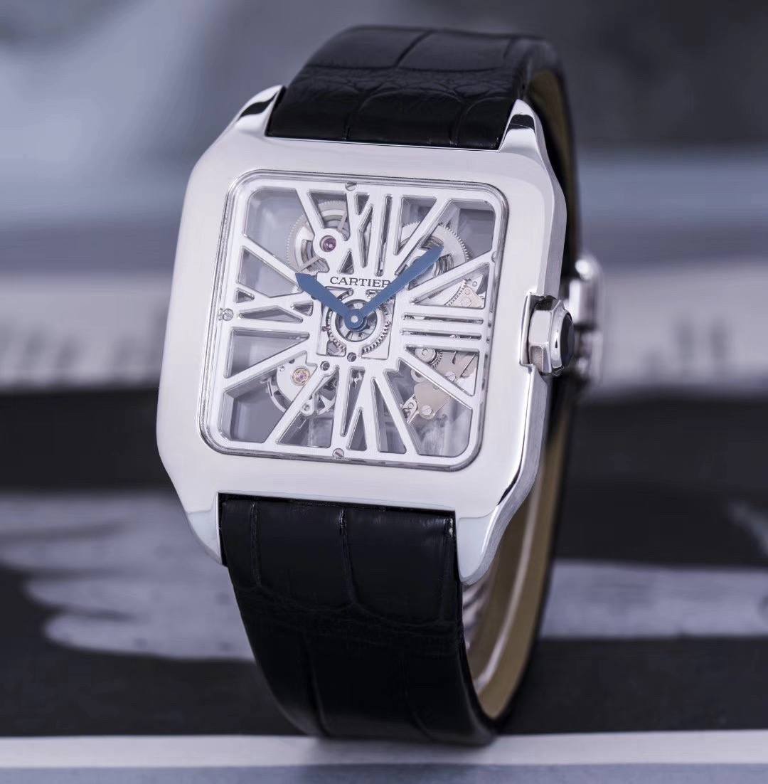 May be an image of wrist watch and text that says 'EXIZ CARTI CARTIEE JER 2 CARTIER F 袋'