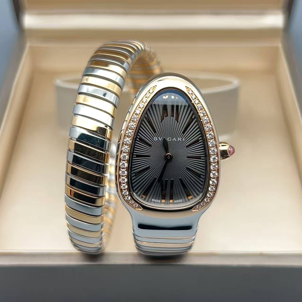 May be an image of jewelry, digital watch and text