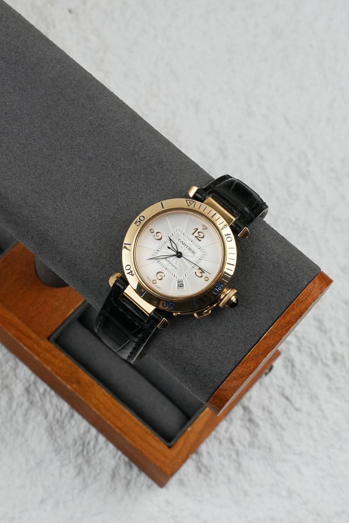 May be an image of wrist watch and text