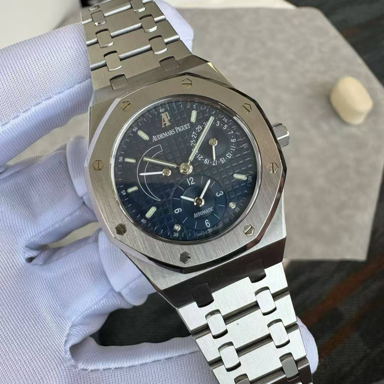 May be an image of wrist watch and text