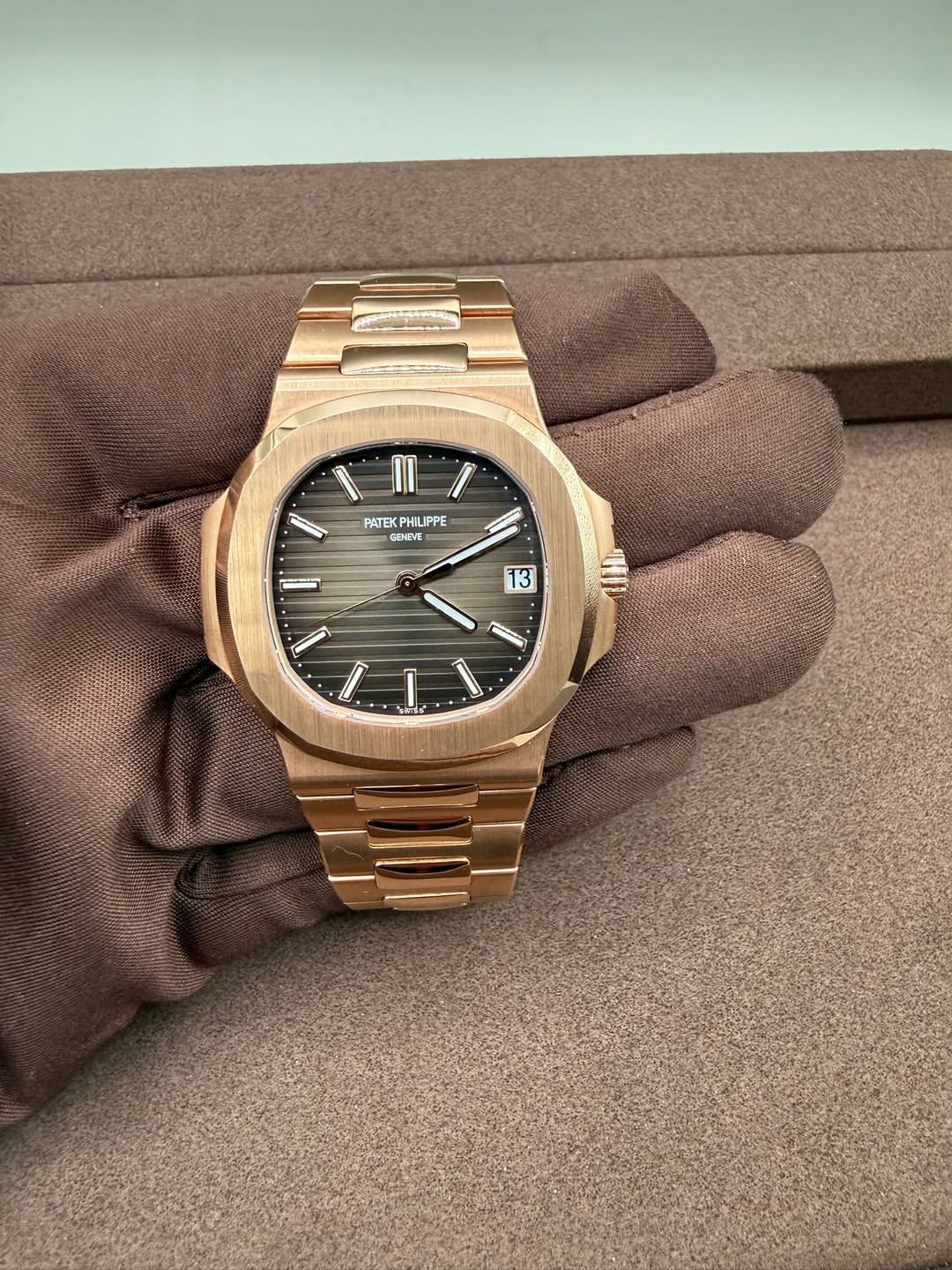 May be an image of wrist watch and text