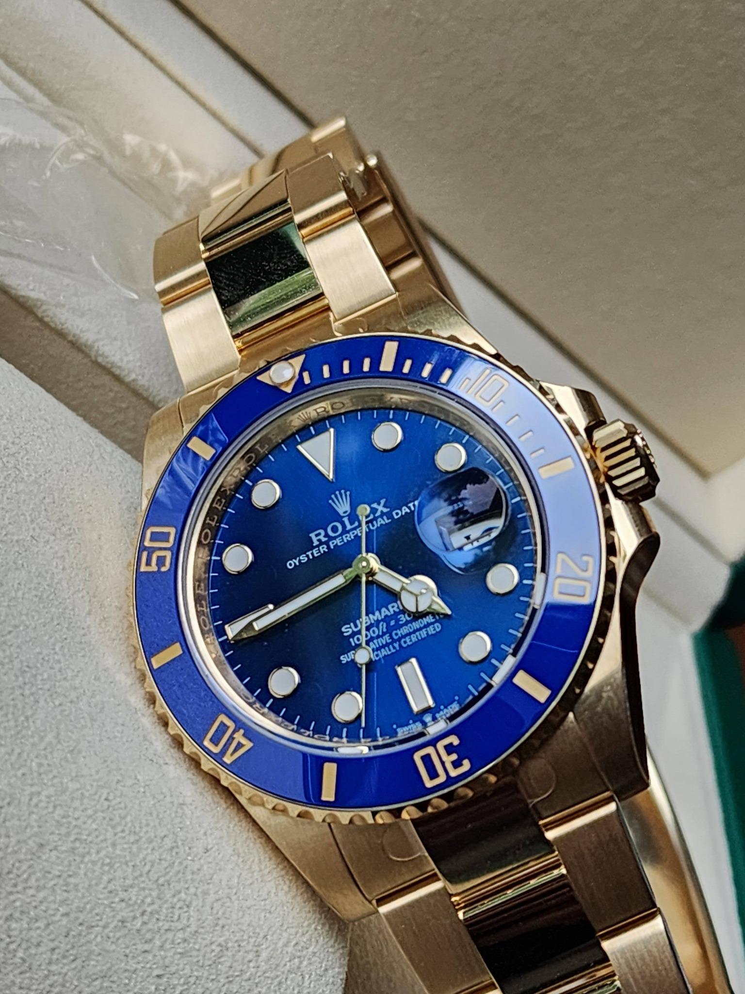 May be an image of wrist watch and text that says 'RE 10 EN 14 50 RO OL2X OL 2x UAL DAT PERPE OYSTER 三 CUID SU SU'BMARI f=30 o 1000/2 CHRONOME CERTEIL CERTIFIED TIVE CIALLY CALLY…
