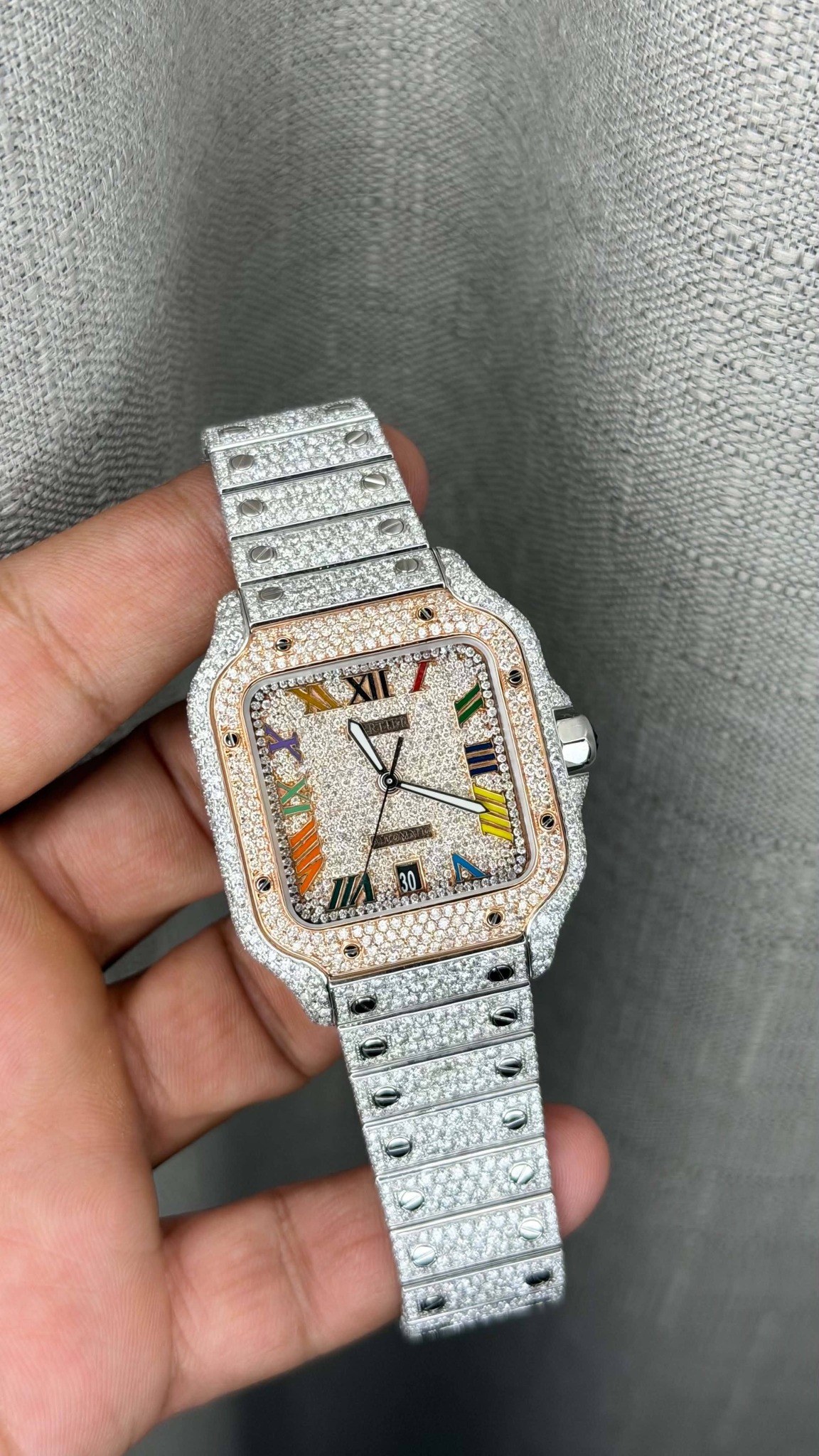 May be an image of wrist watch and text