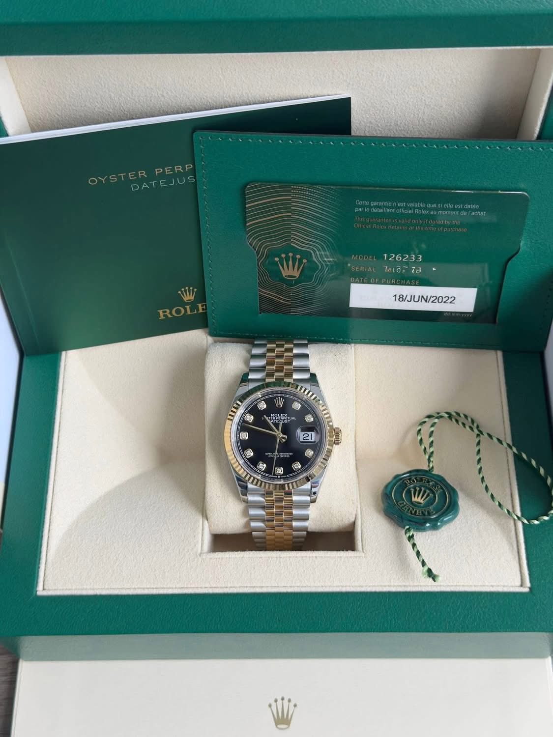 May be an image of wrist watch and text that says 'OYSTER OYSTERPERP OYSDATEJUS PERP W ROLE 126233 TidETa ไมเละม ไอเอิะรง 18/JUN/2022 W ® ing 2 21 a 2 a 9 & bg ಿ 0'