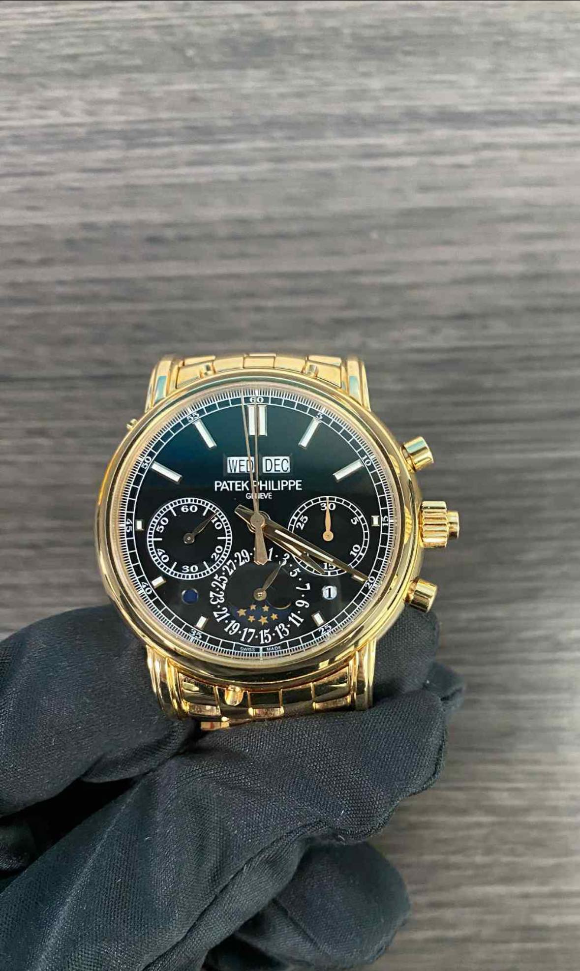 May be an image of wrist watch and text
