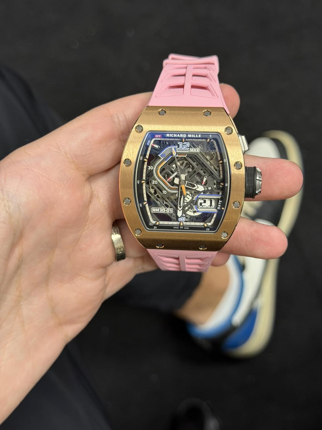 May be an image of digital watch and text